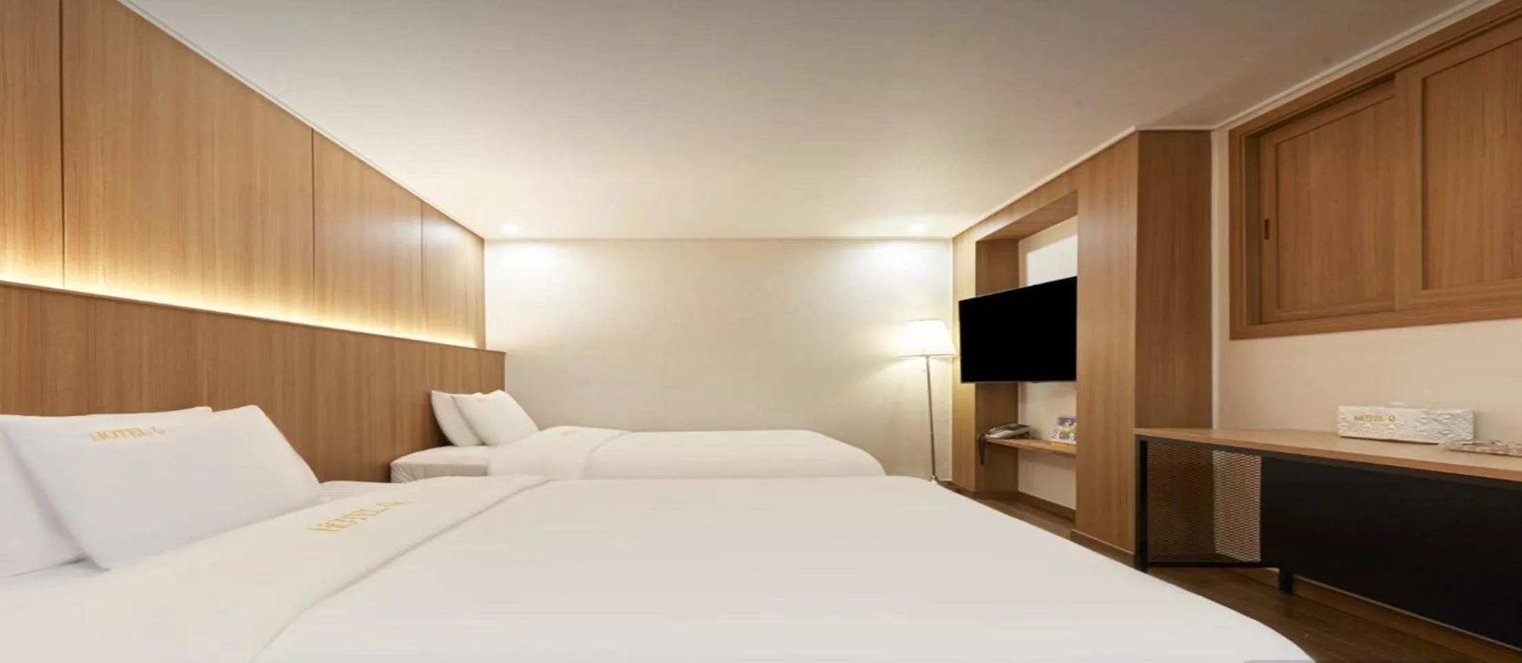 Bed in Hotel Q Chuncheon