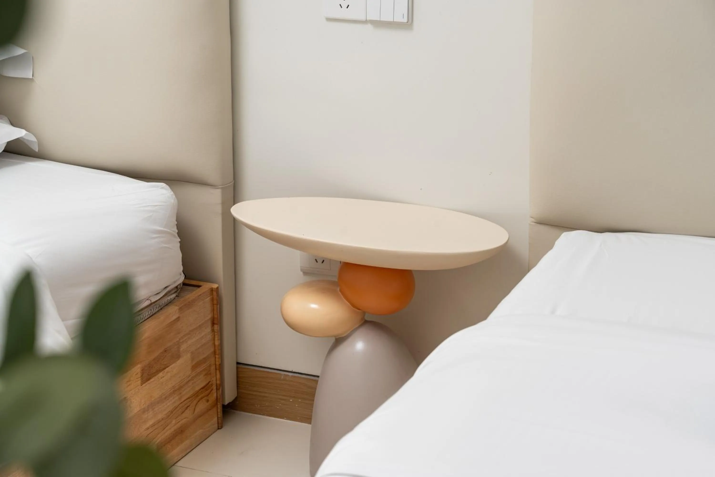 Bed in Grand Continental Apartment