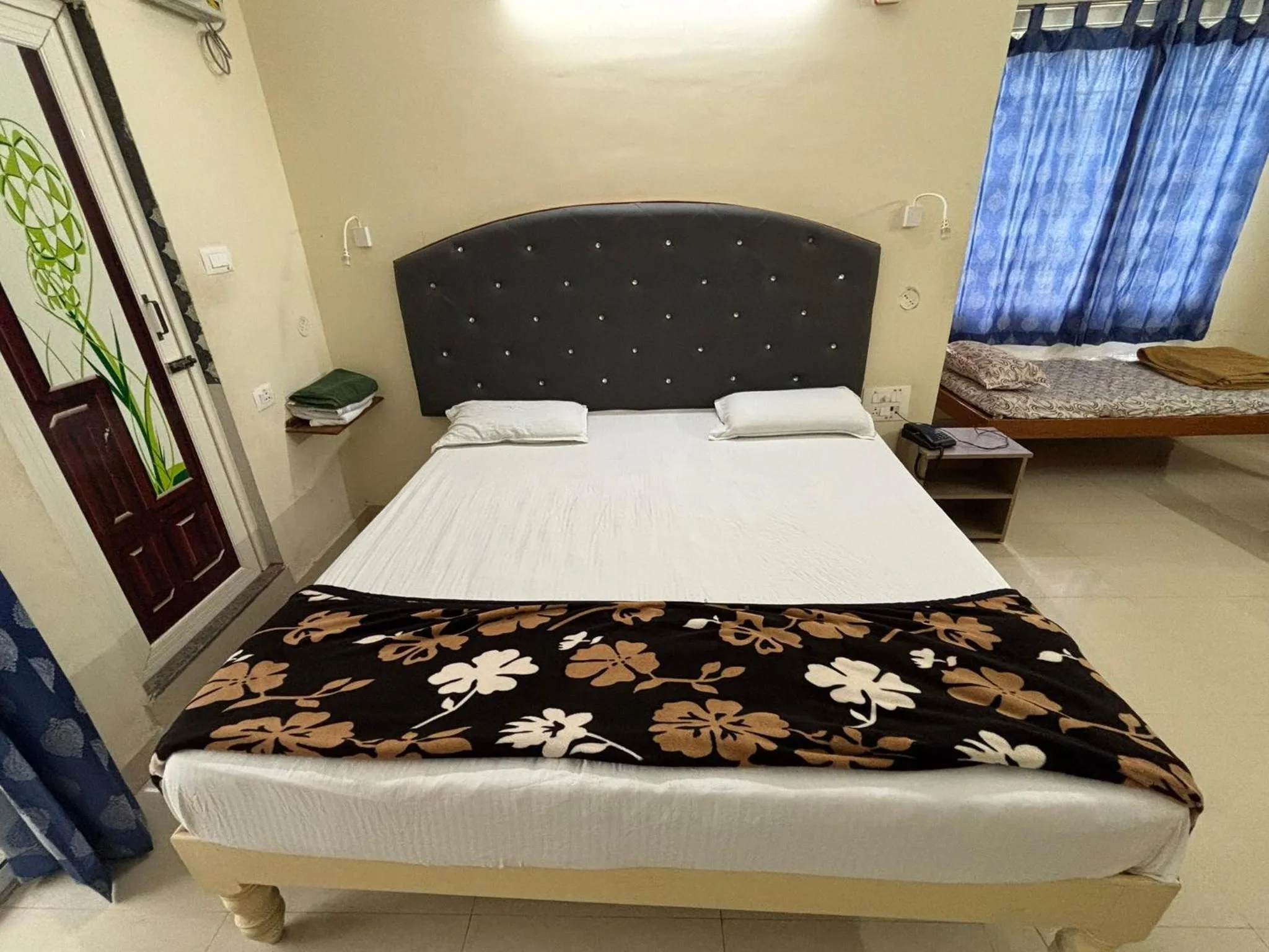 Bed in Srinivasa Hotel