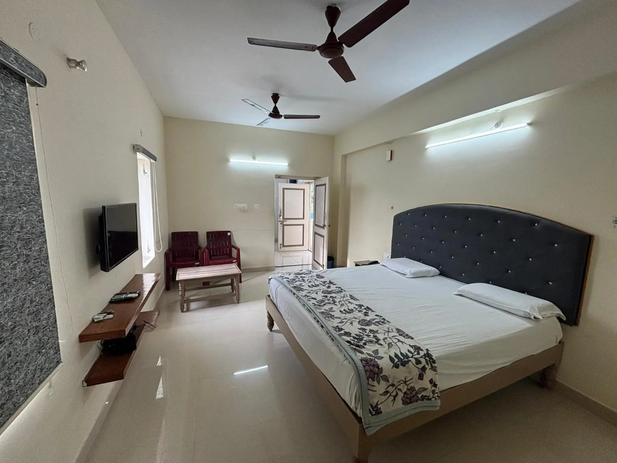 Bed in Srinivasa Hotel
