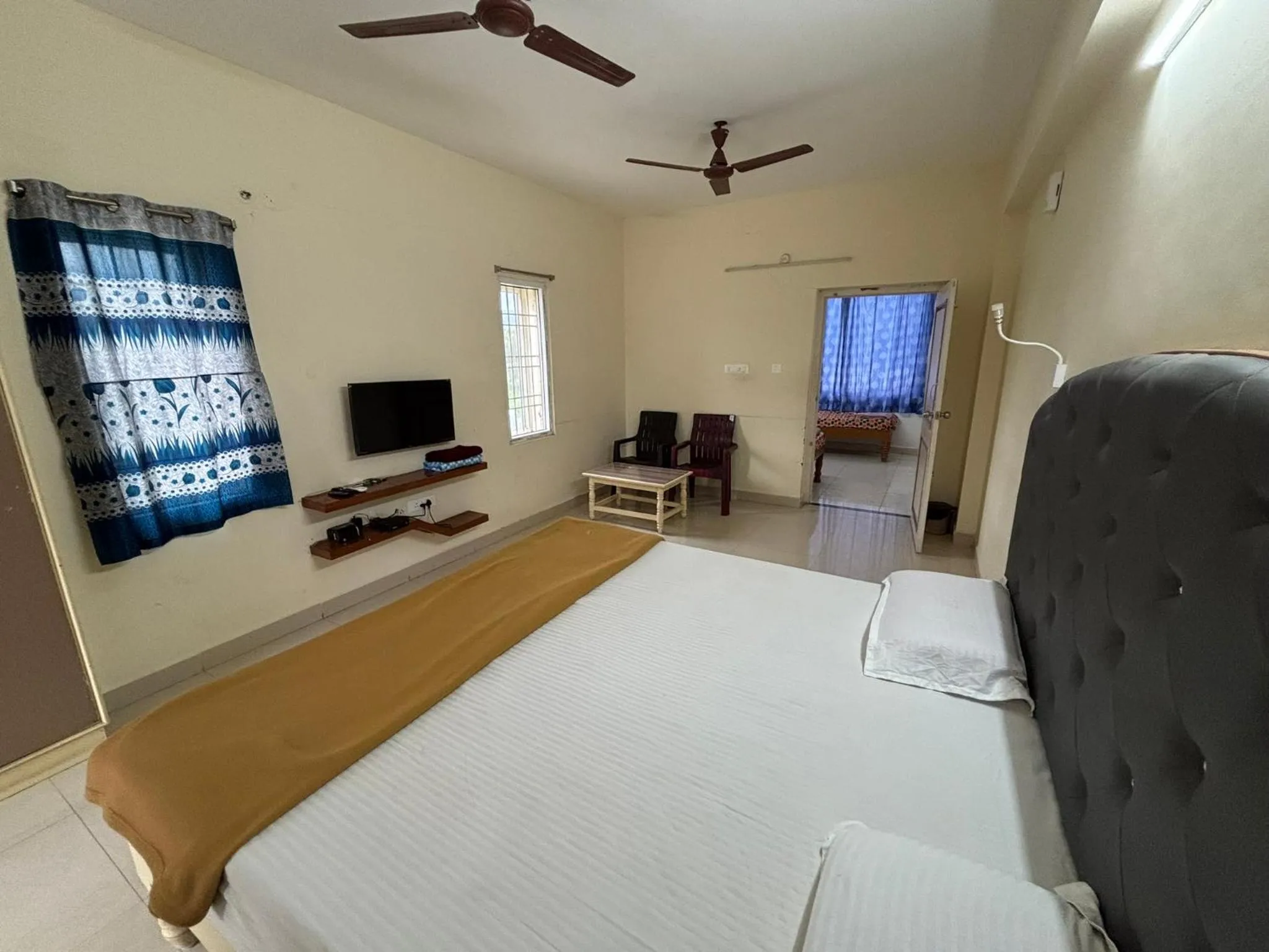 Bed in Srinivasa Hotel