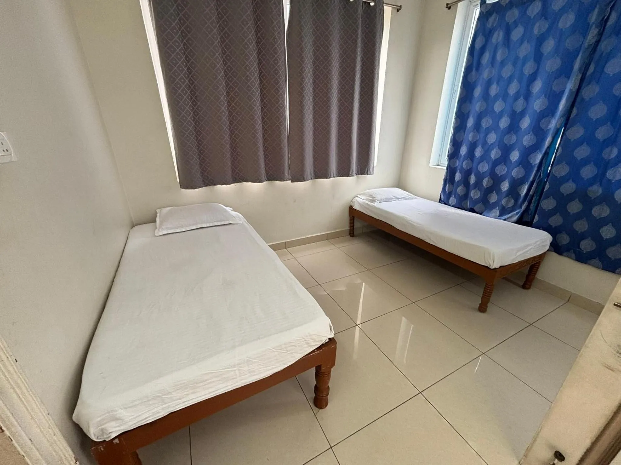 Bed in Srinivasa Hotel