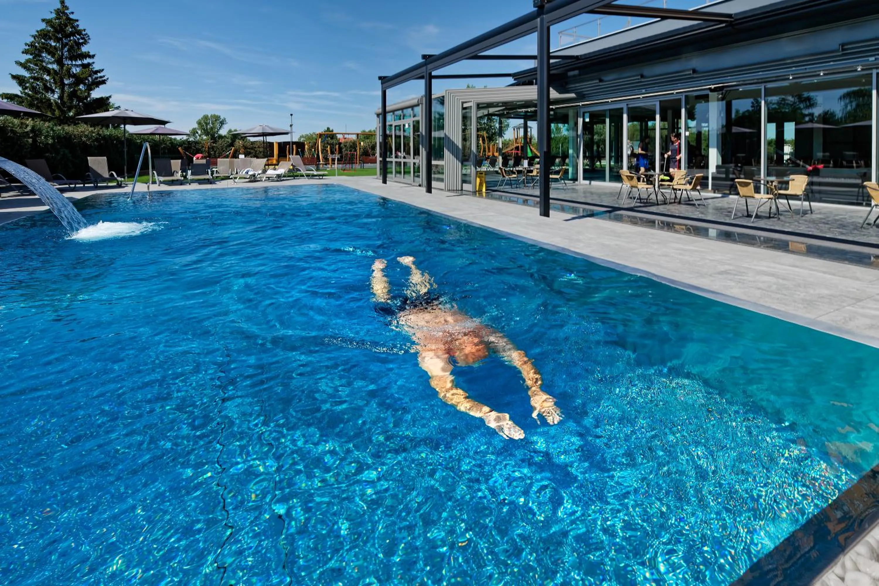 People in Hotel Aura Design & Garden Pool