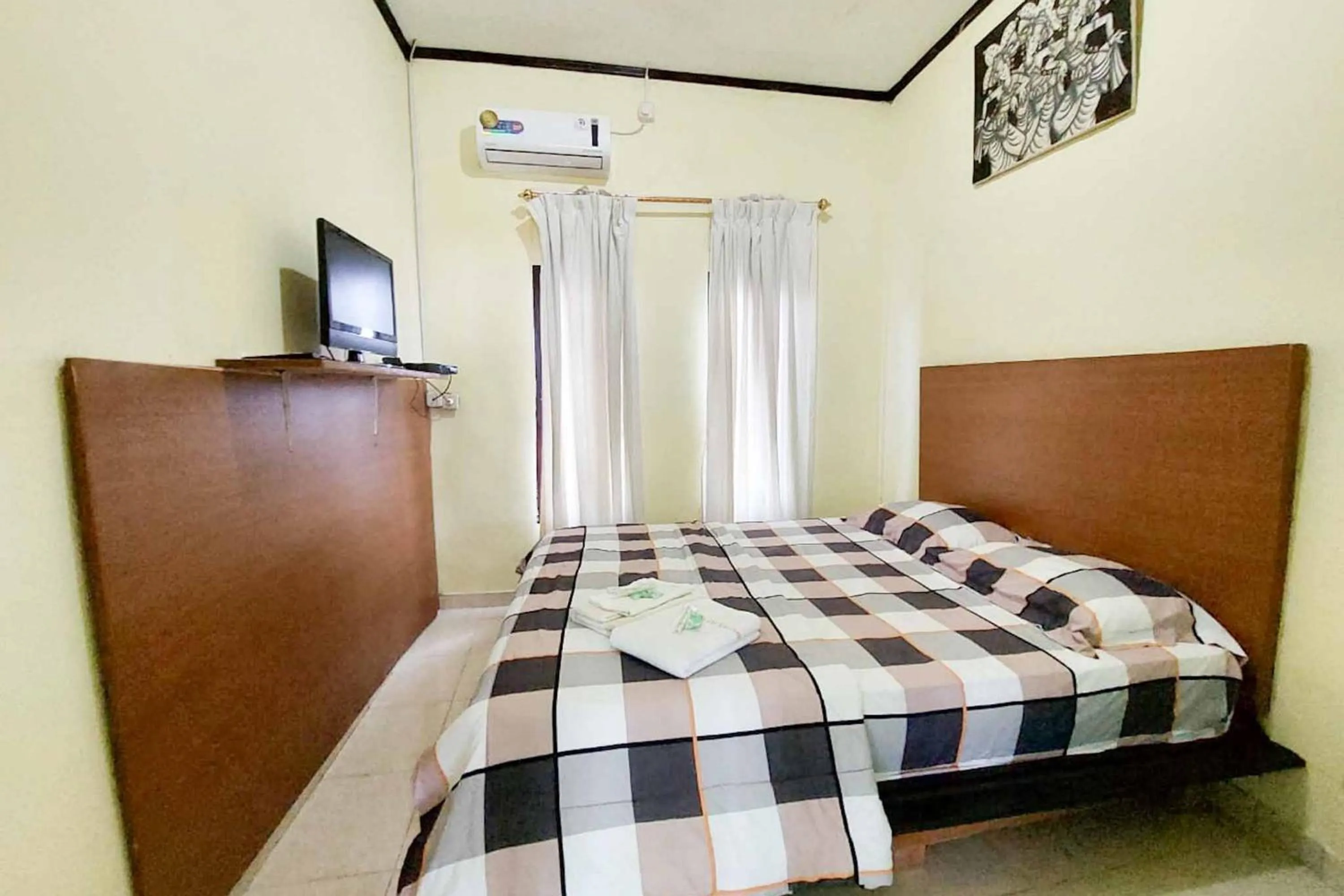 Bedroom, Bed in Quattrick Dee Homestay Mitra RedDoorz