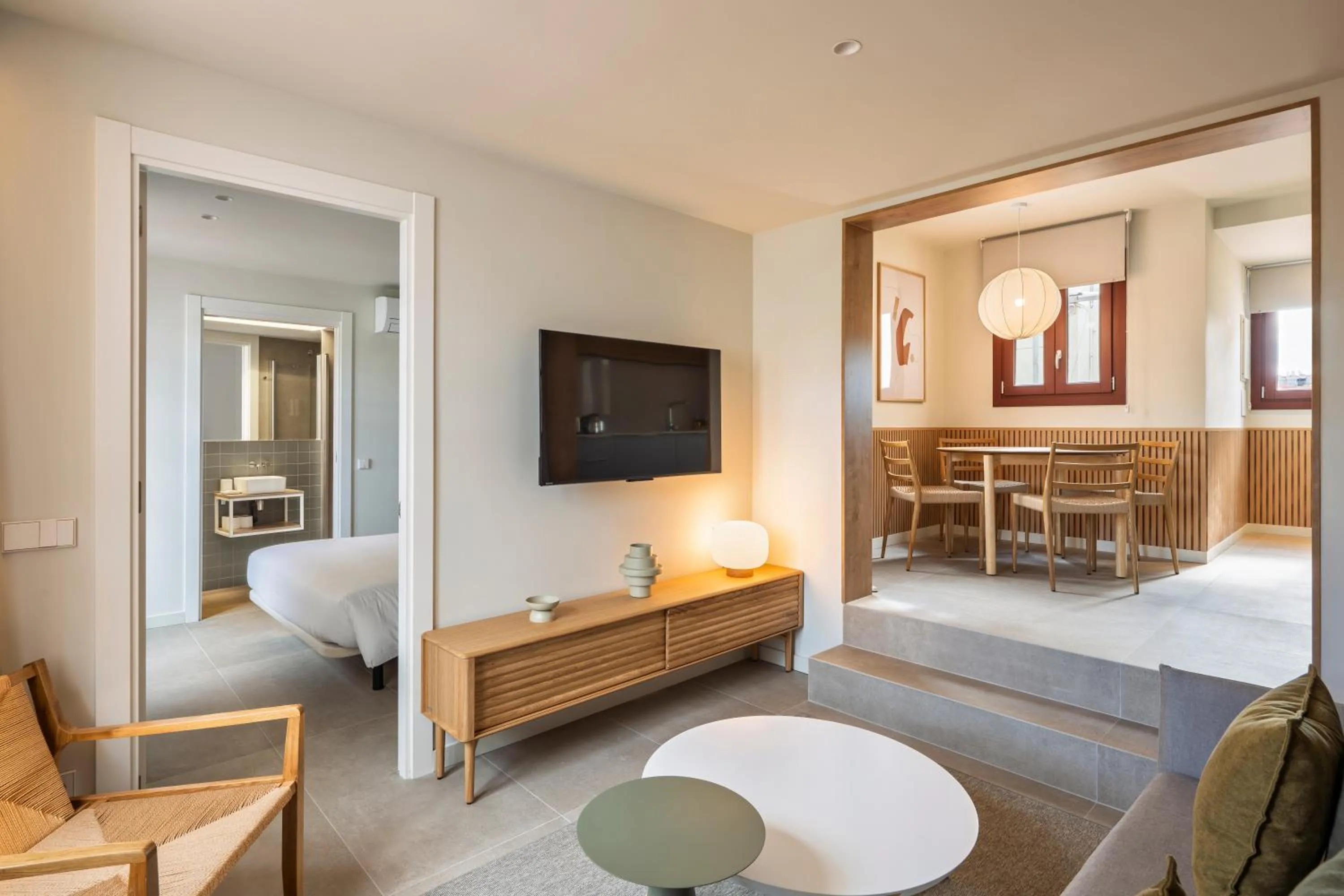 Living room, Bed in Aspasios Garden Apartments