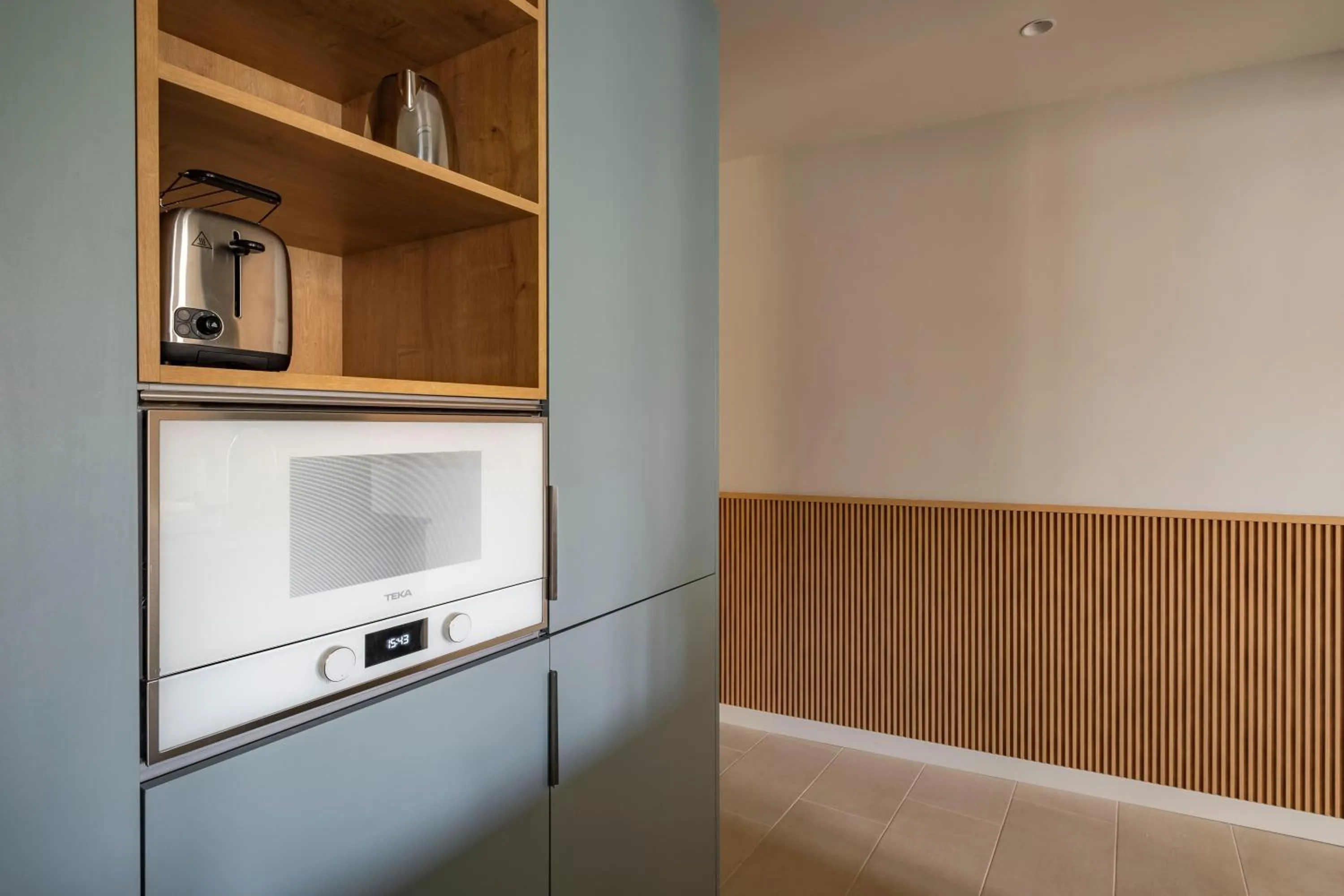 Kitchen or kitchenette in Aspasios Garden Apartments