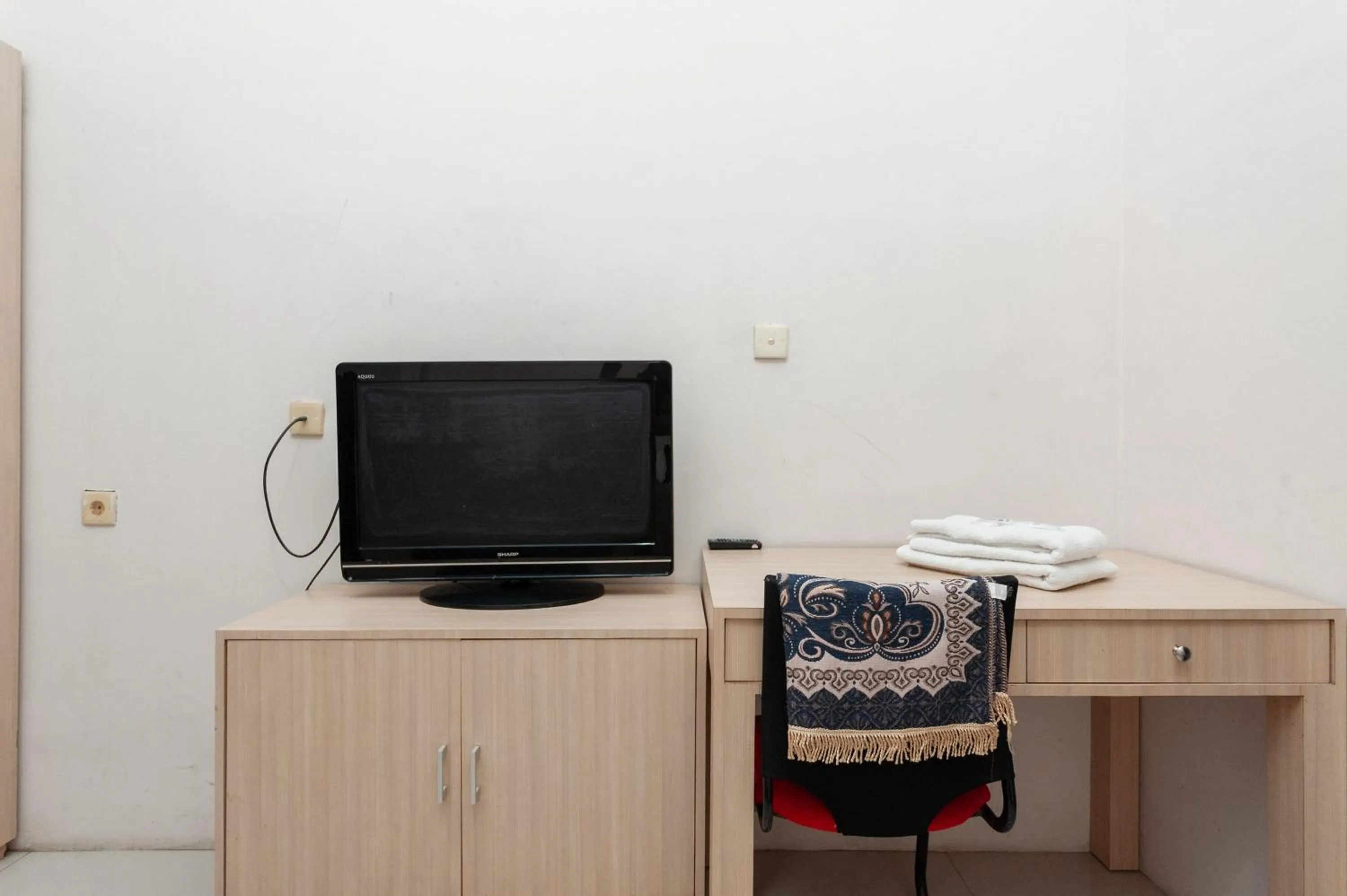 TV and multimedia in RedDoorz Syariah near Banda Aceh Convention Hall