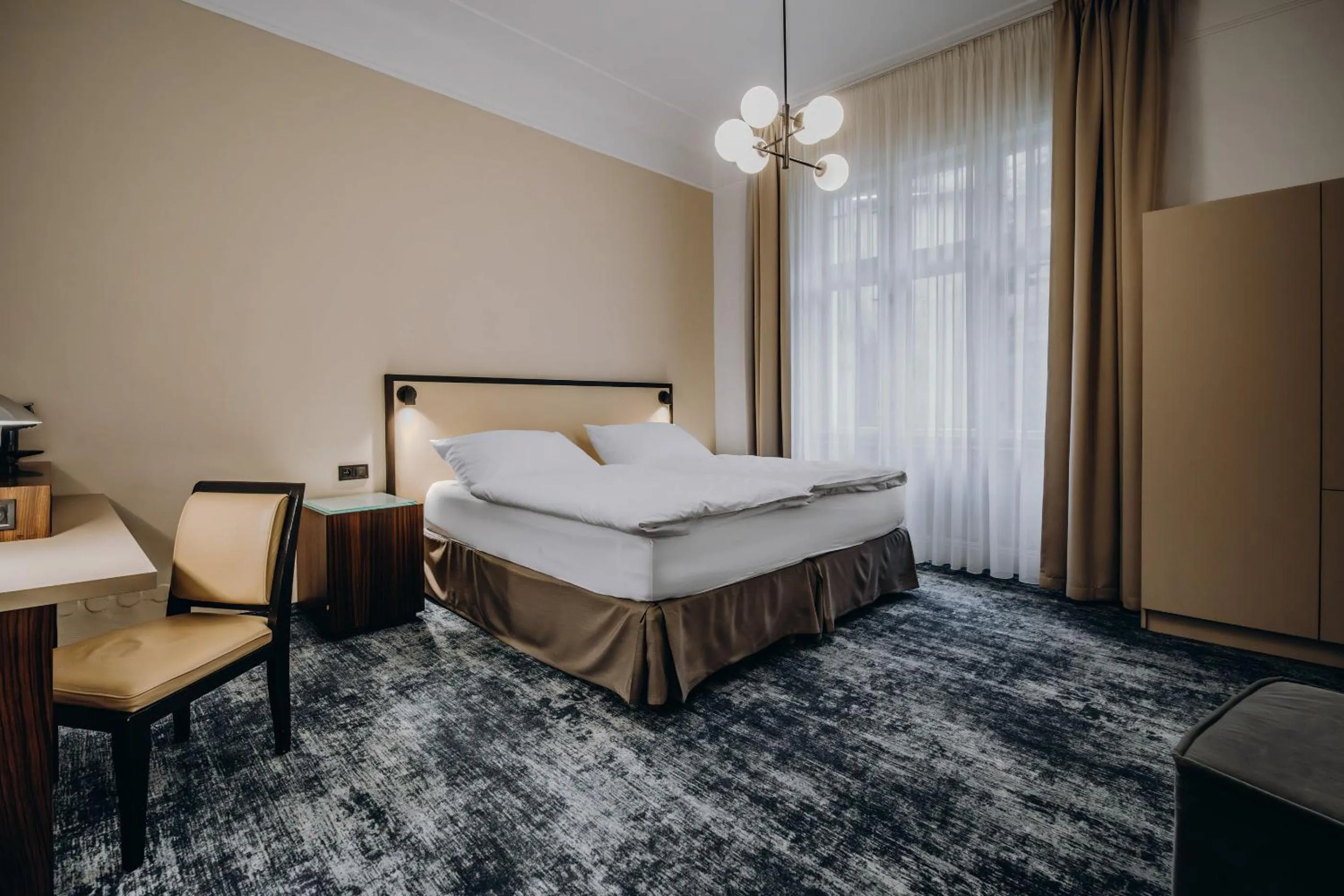 Bed in Esplanade Self Check-in Hotel