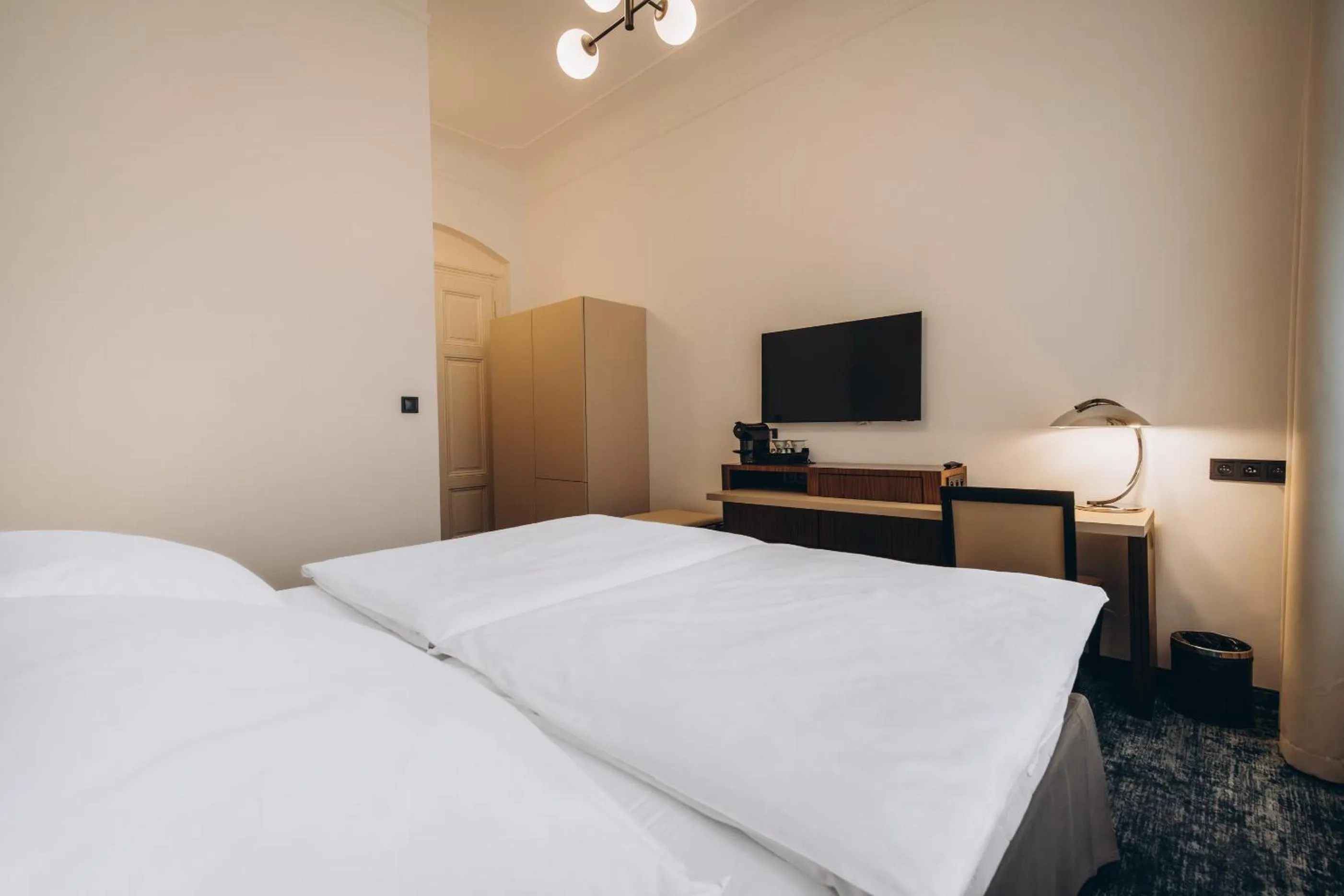 Bed in Esplanade Self Check-in Hotel