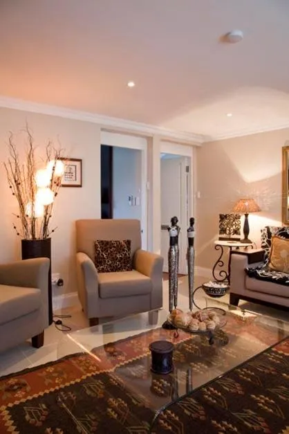 Communal lounge/ TV room in Forest Manor Boutique Guesthouse