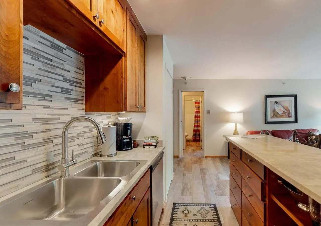 Kitchen or kitchenette in Lion Square Lodge Condos by TO