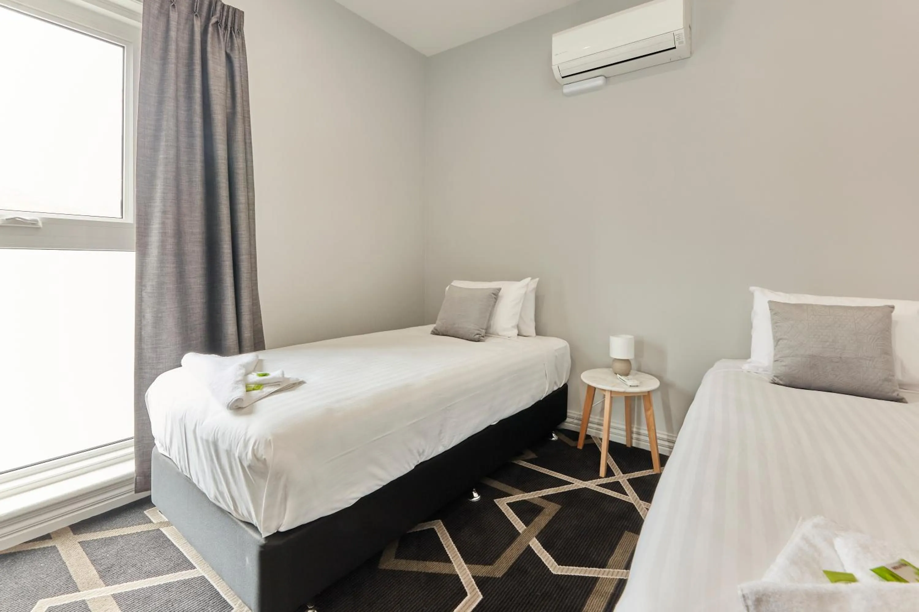 air conditioner, Bed in Sports Garden Hotel