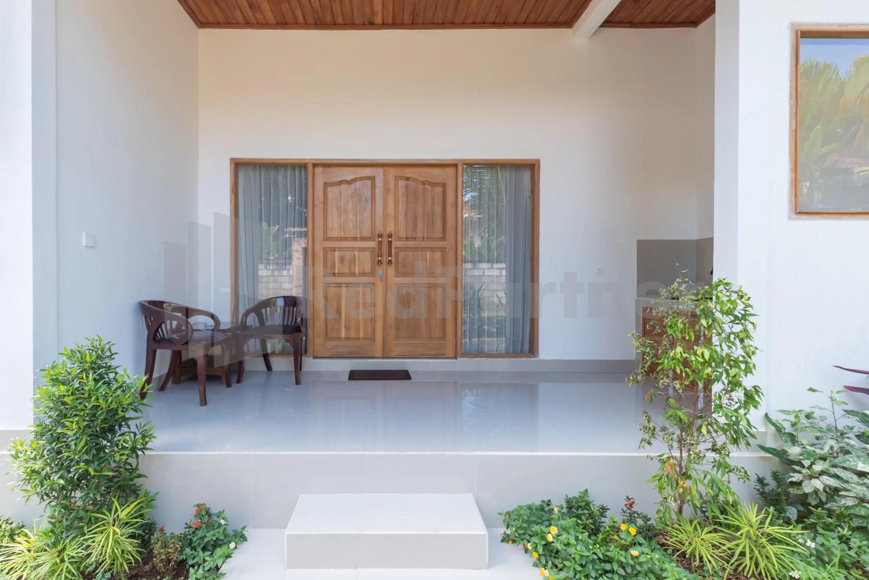 Seating area in Brisk Homestay Uluwatu RedPartner