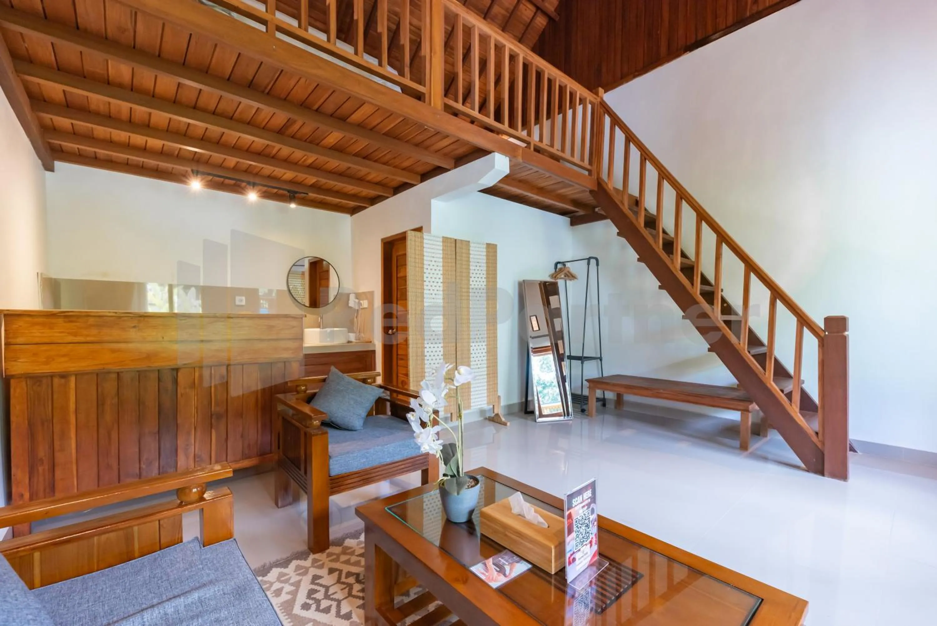 Seating area in Brisk Homestay Uluwatu RedPartner