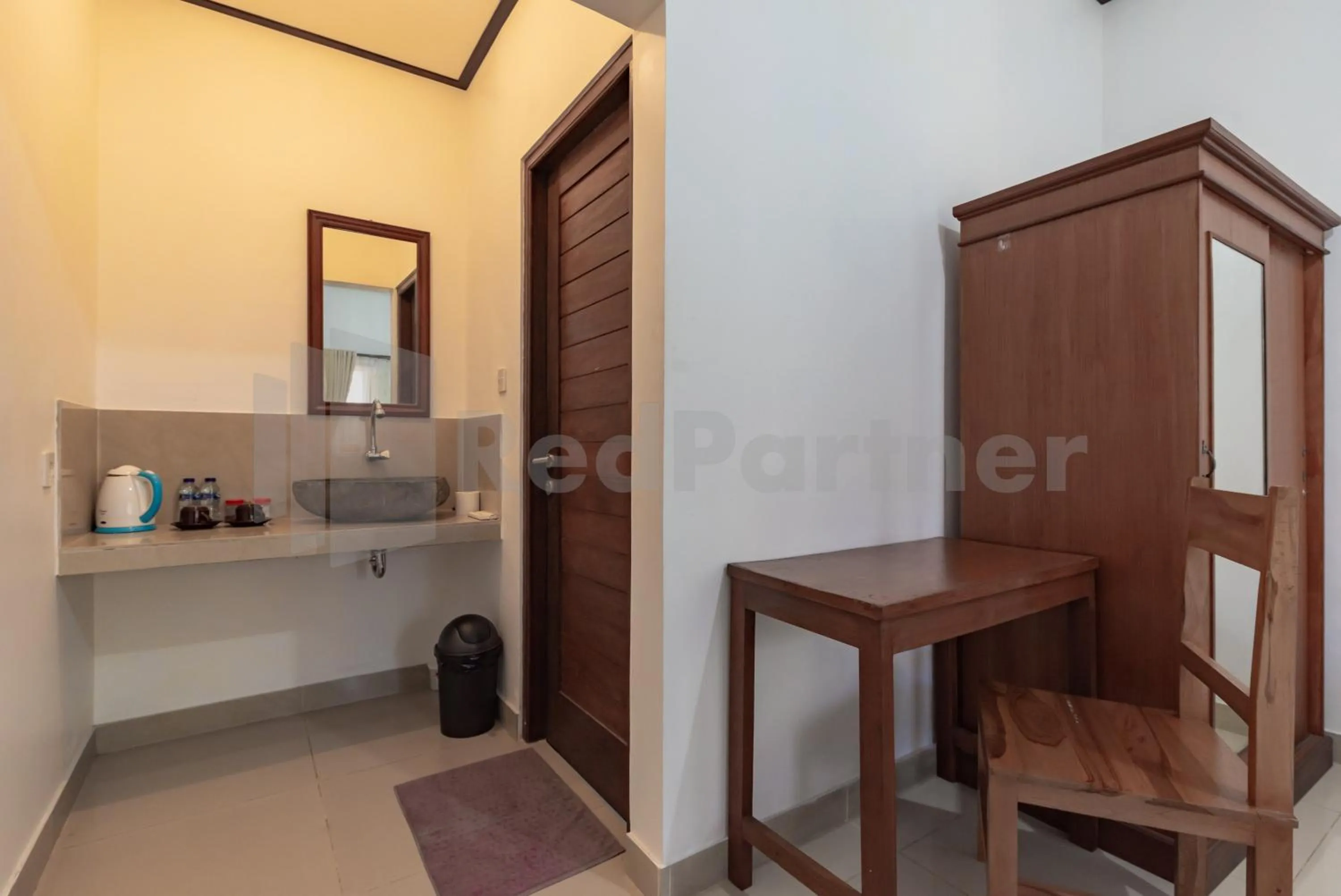 Seating area in Brisk Homestay Uluwatu RedPartner