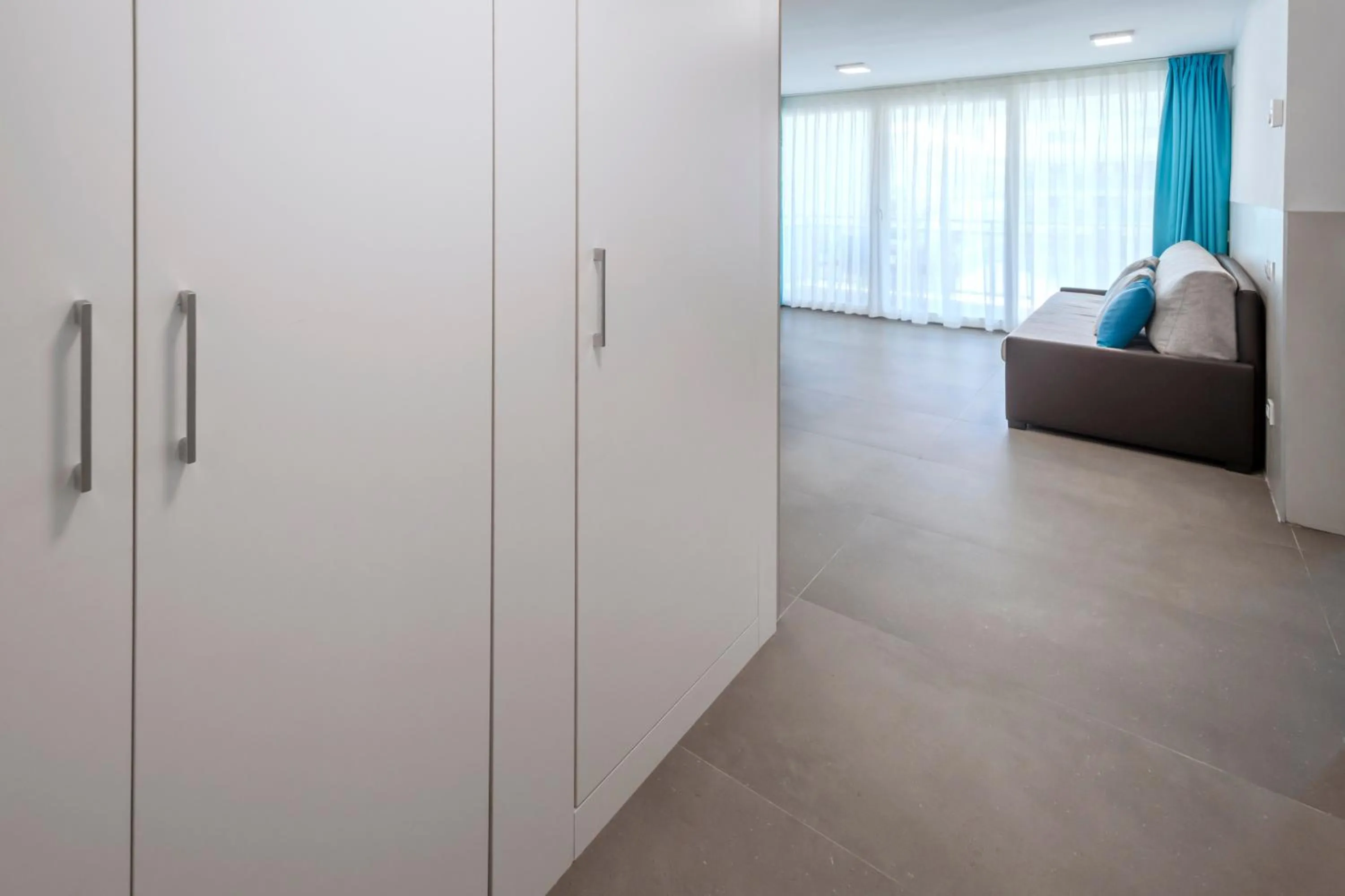 Communal lounge/ TV room, Bed in Rentalmar Salou Playa Family Suites & Pool