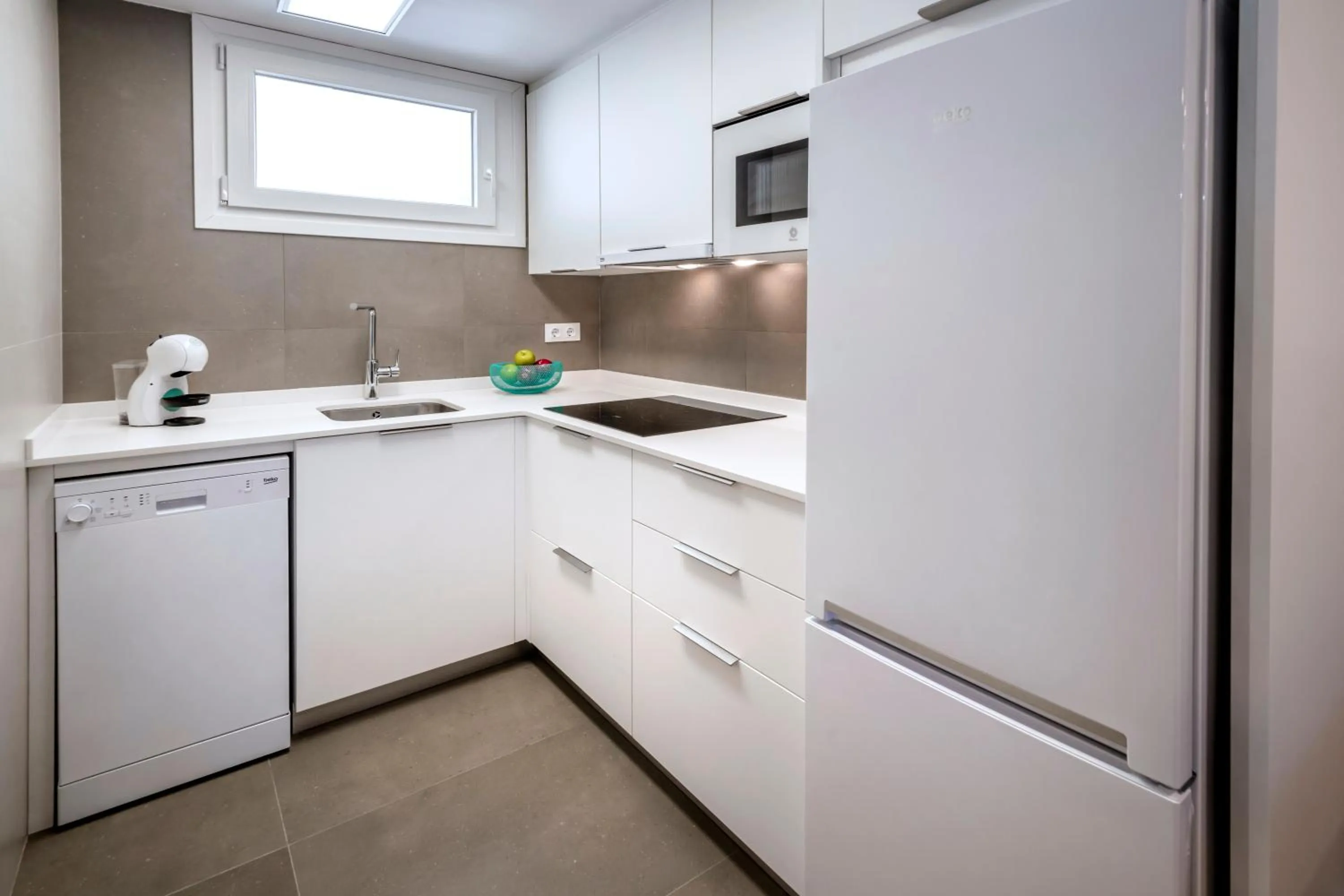 Kitchen or kitchenette in Rentalmar Salou Playa Family Suites & Pool