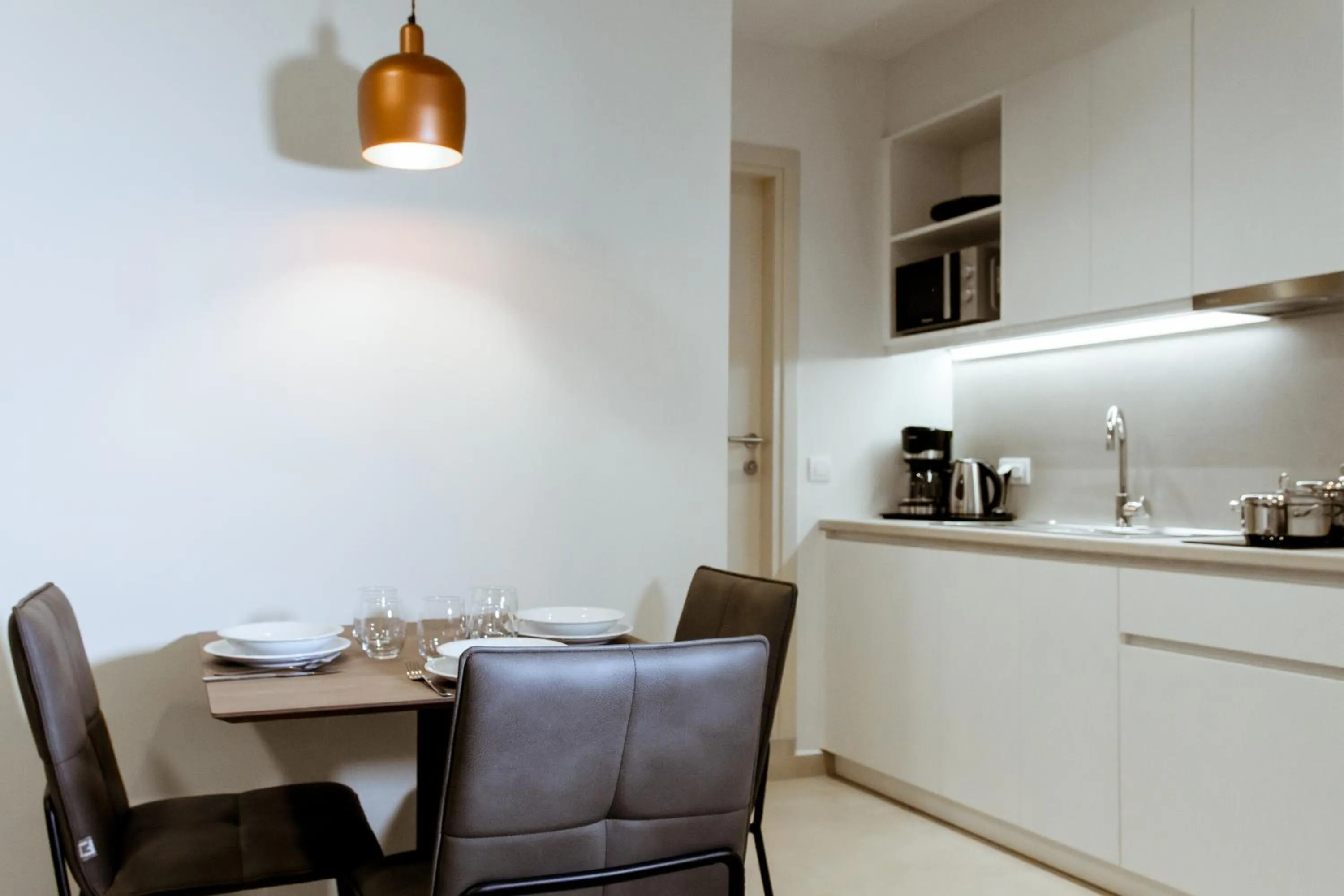 Kitchen or kitchenette in ANTEL Suites & Apartments