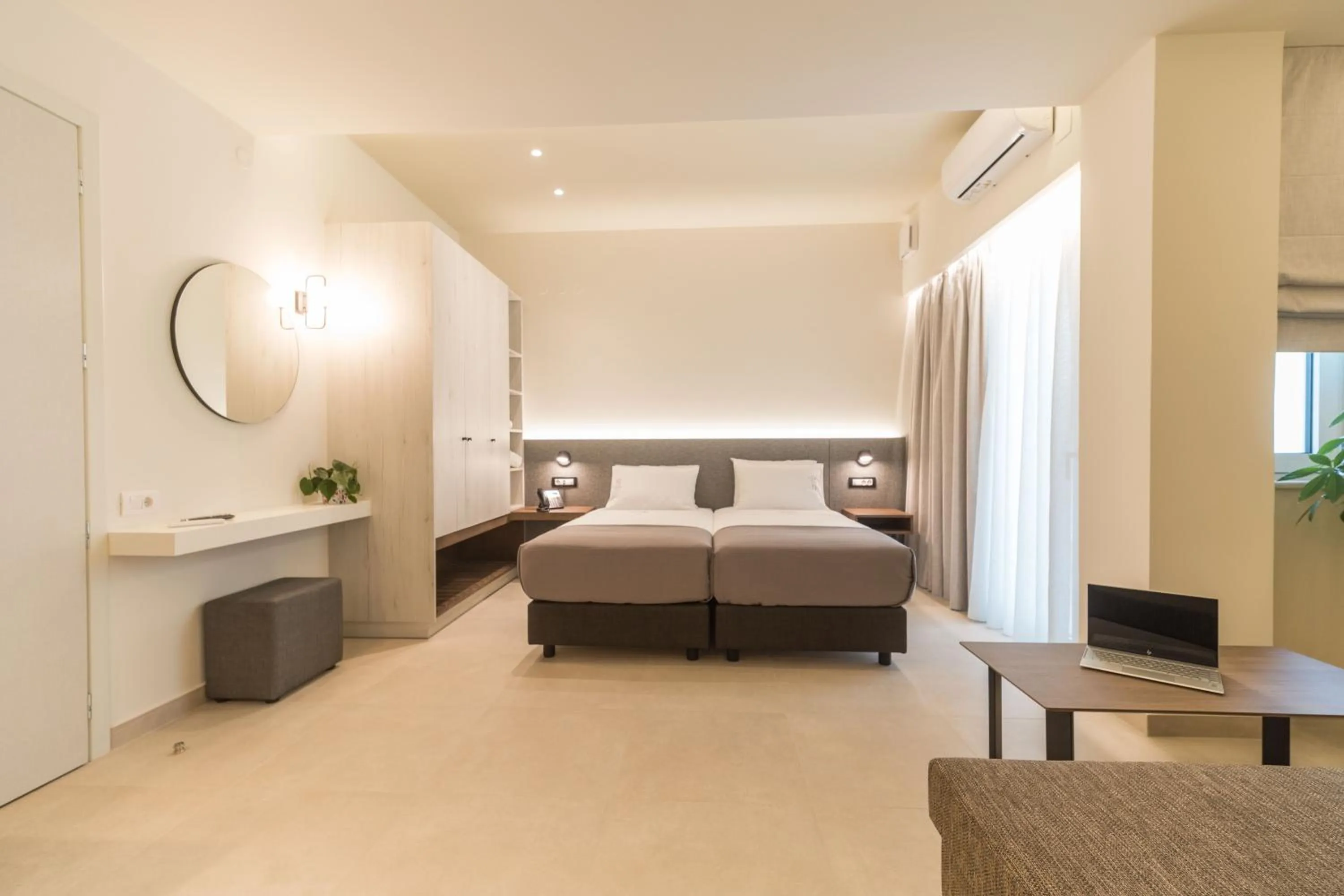 Bed in ANTEL Suites & Apartments