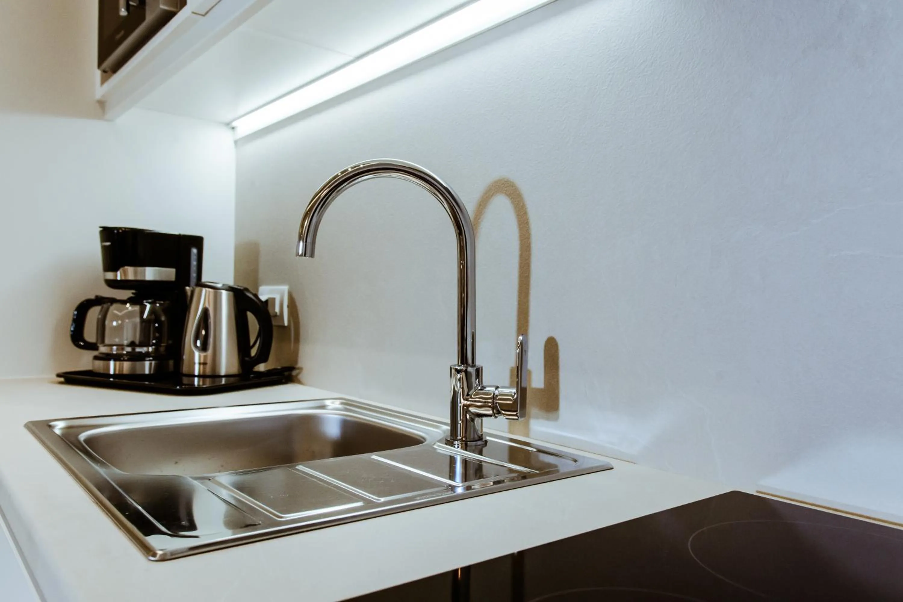 Kitchen or kitchenette in ANTEL Suites & Apartments