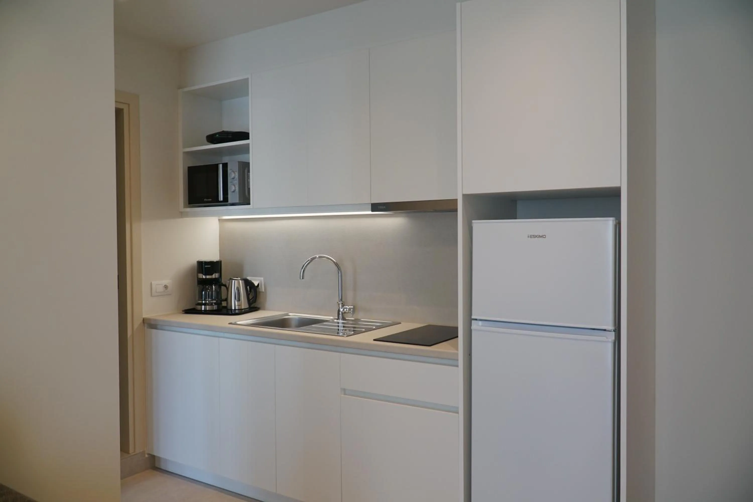 Kitchen or kitchenette in ANTEL Suites & Apartments
