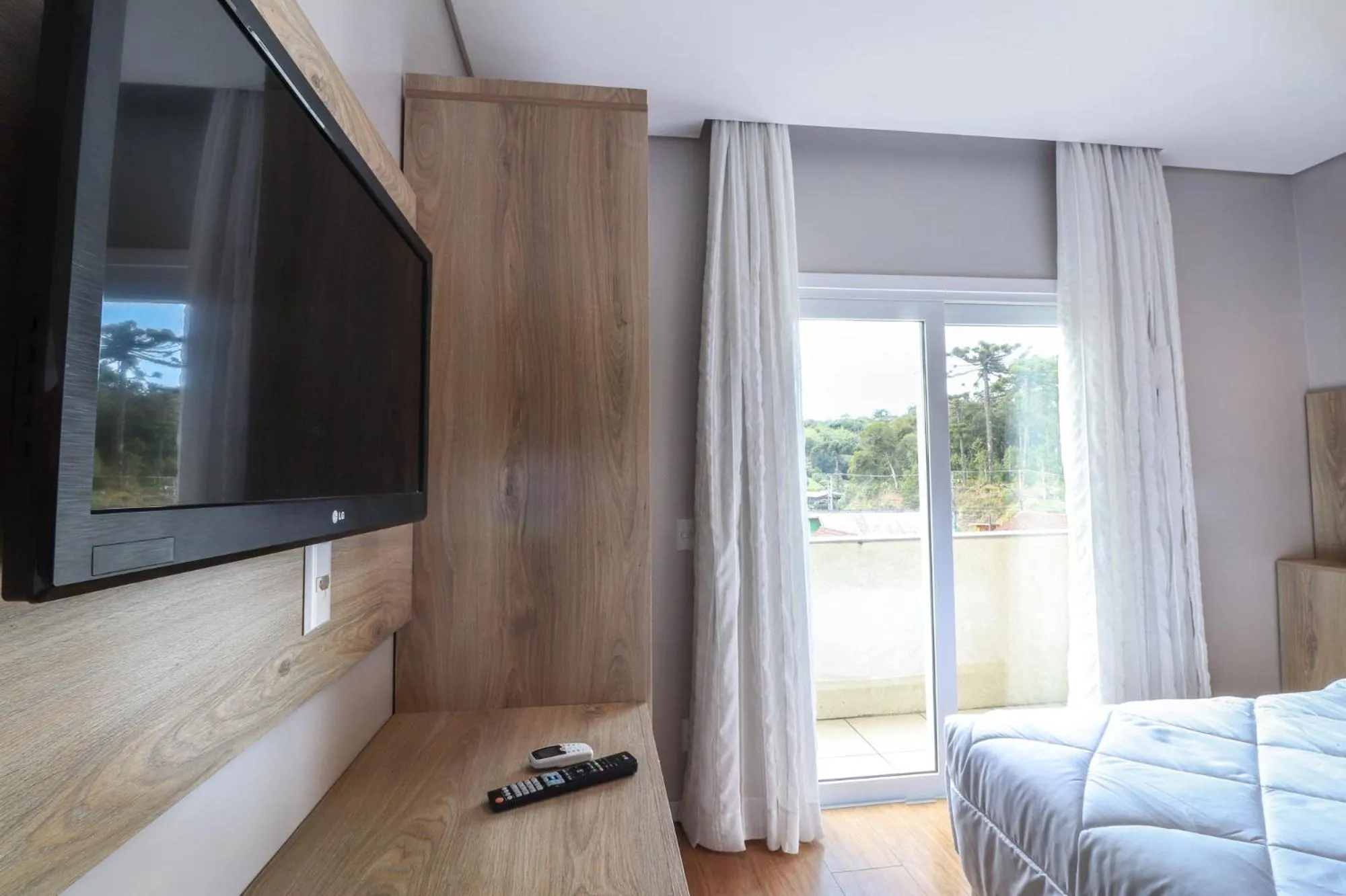 TV and multimedia, Bed in Pousada Bella Viena