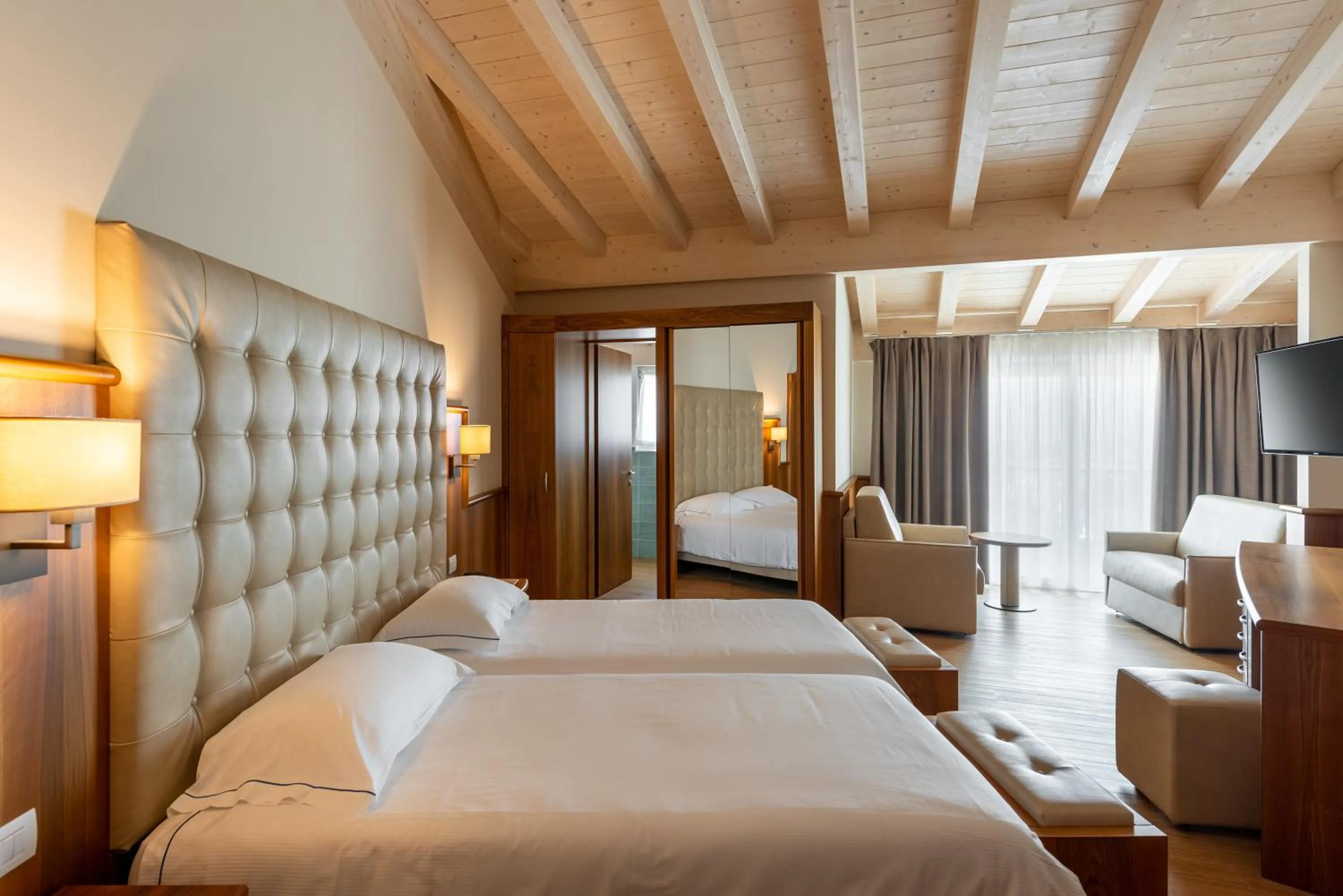 Bed in Hotel Palme & Suite