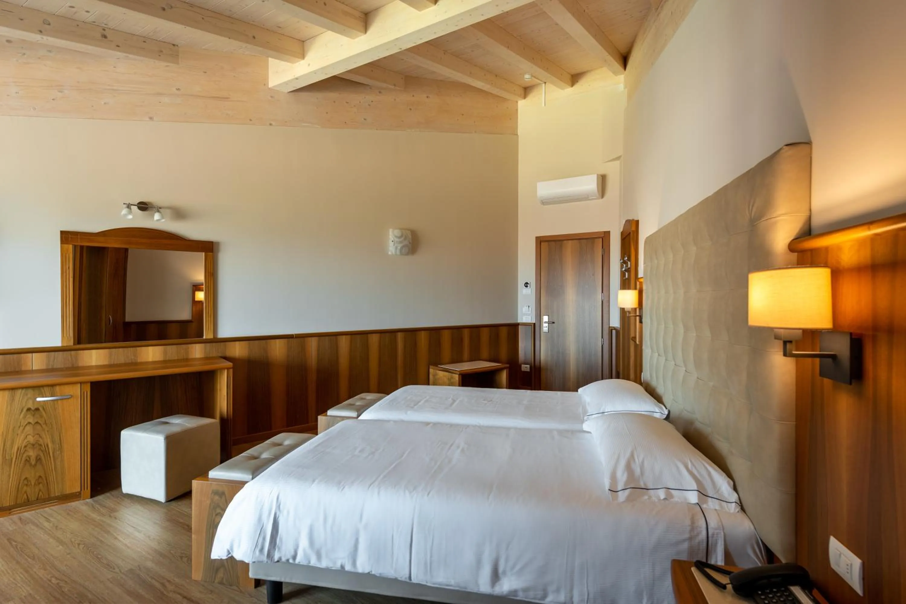 Bed in Hotel Palme & Suite