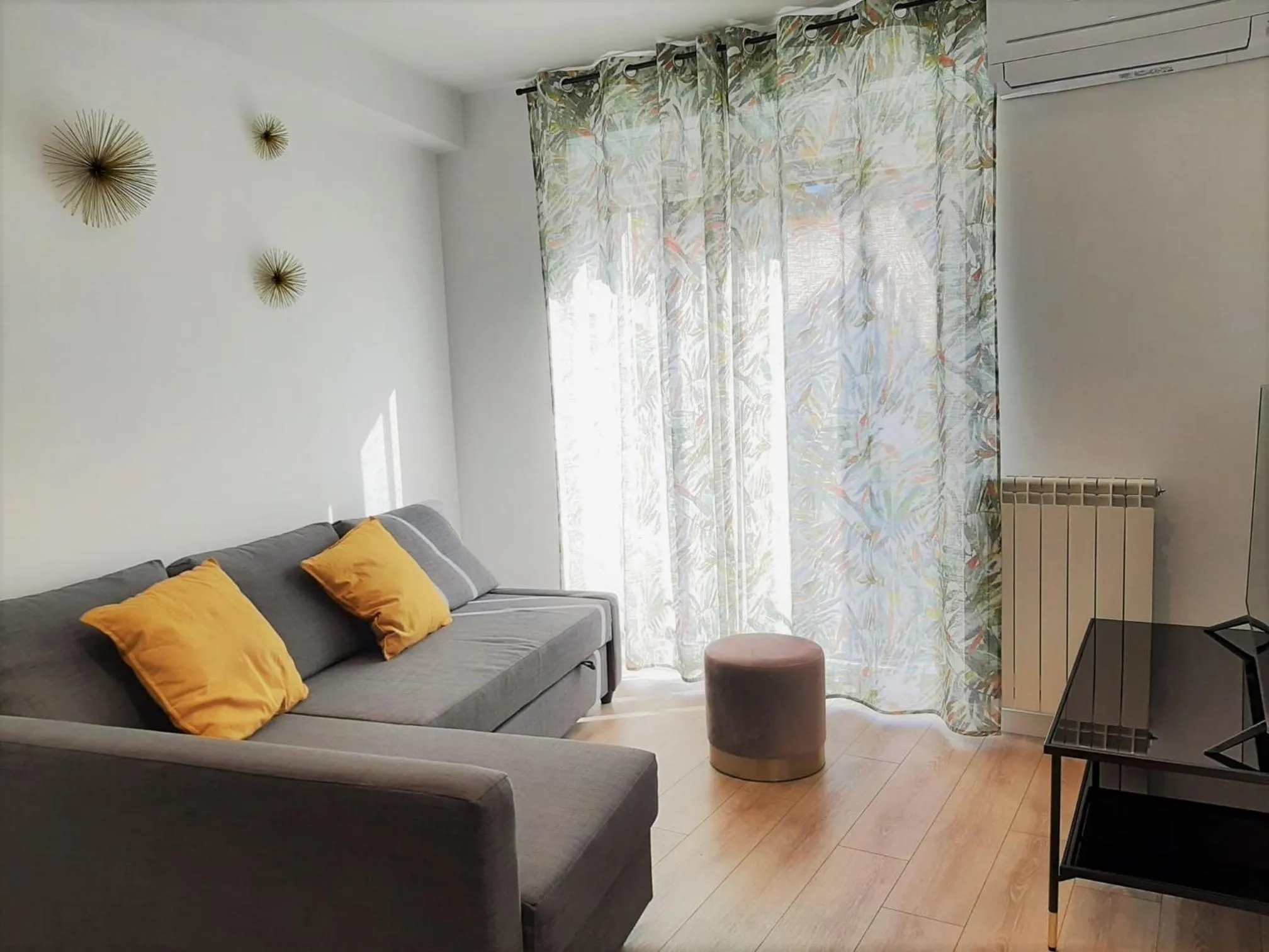 Living room in Apartamentos Celestina by gaiarooms