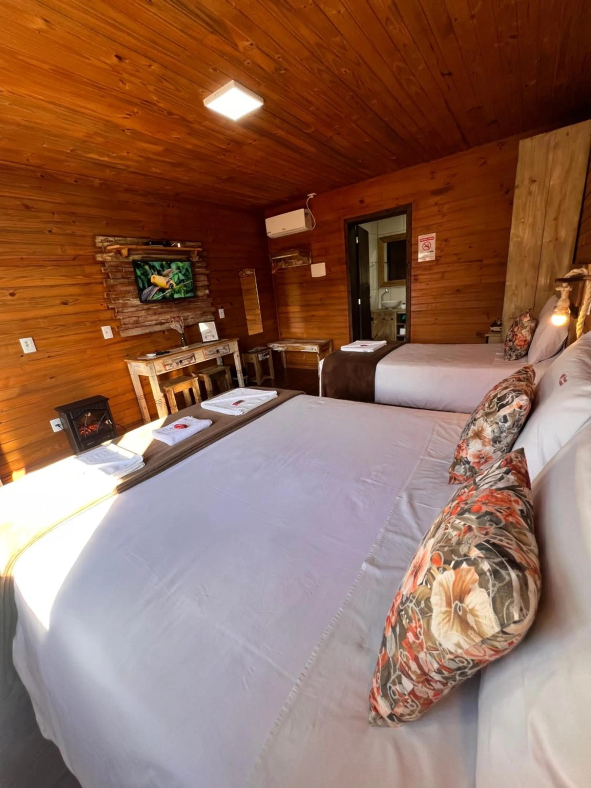 Bed in Pousada Costaneira