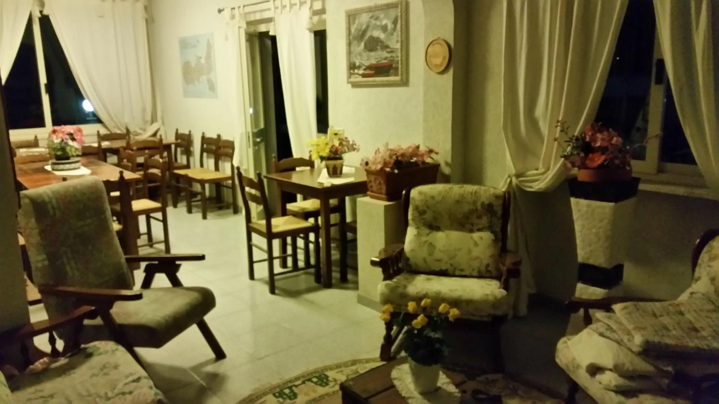 Communal lounge/ TV room in Baia Azzurra