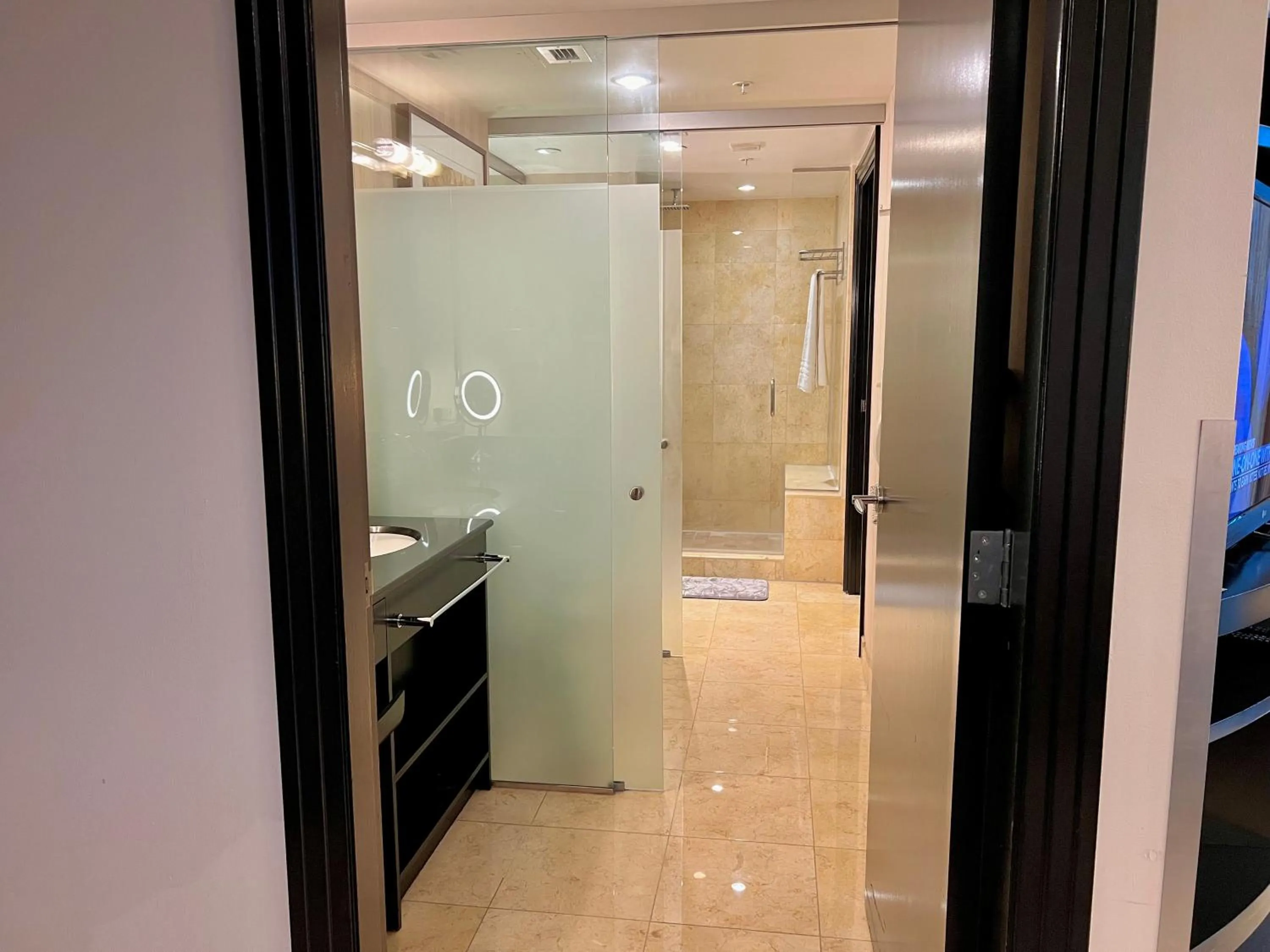 Bathroom in Boutique Suites 3 min walk to beach