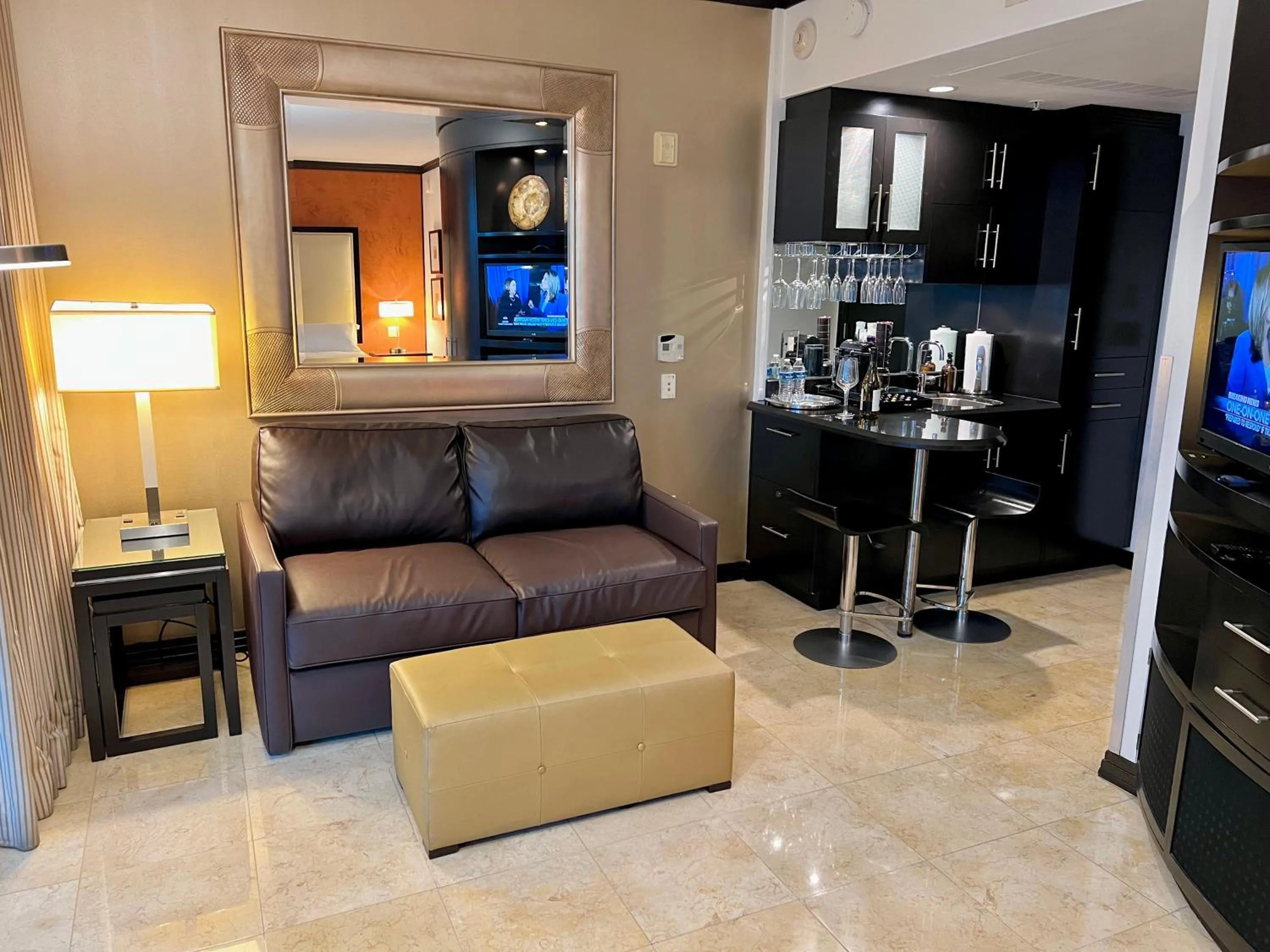 TV and multimedia in Boutique Suites 3 min walk to beach