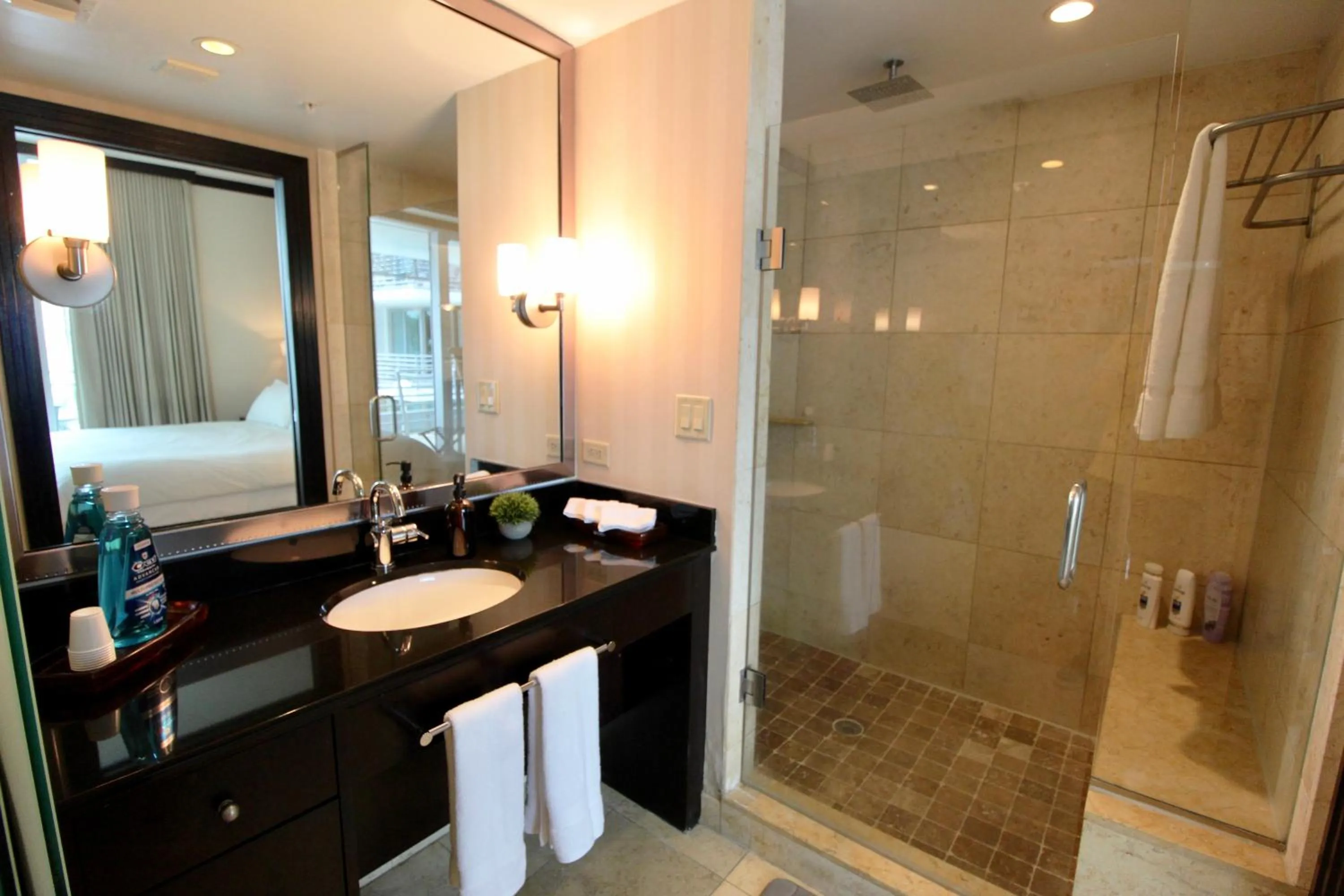 Shower in Boutique Suites 3 min walk to beach