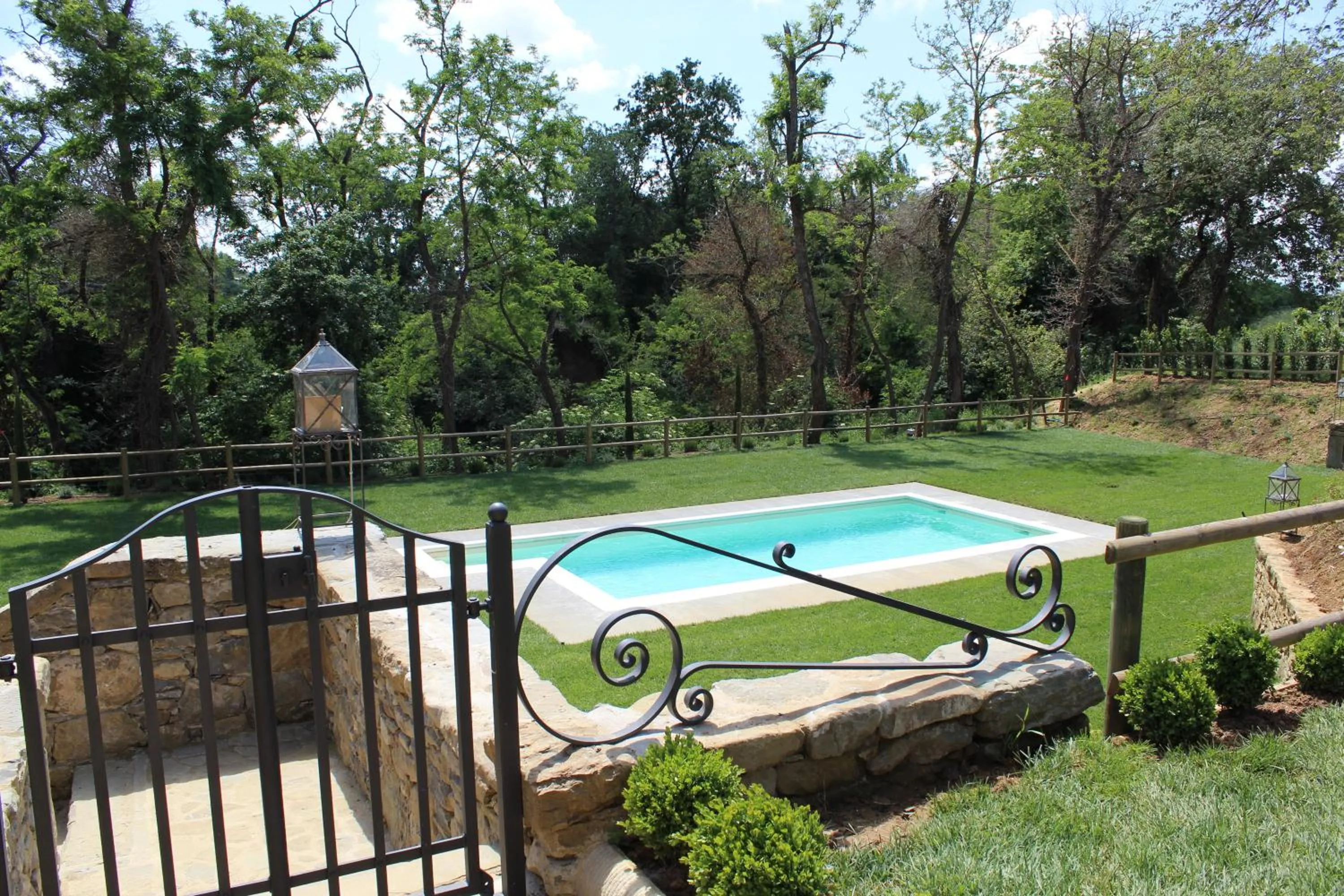 Swimming pool in La Cantina Relais - Fattoria Il Cipresso
