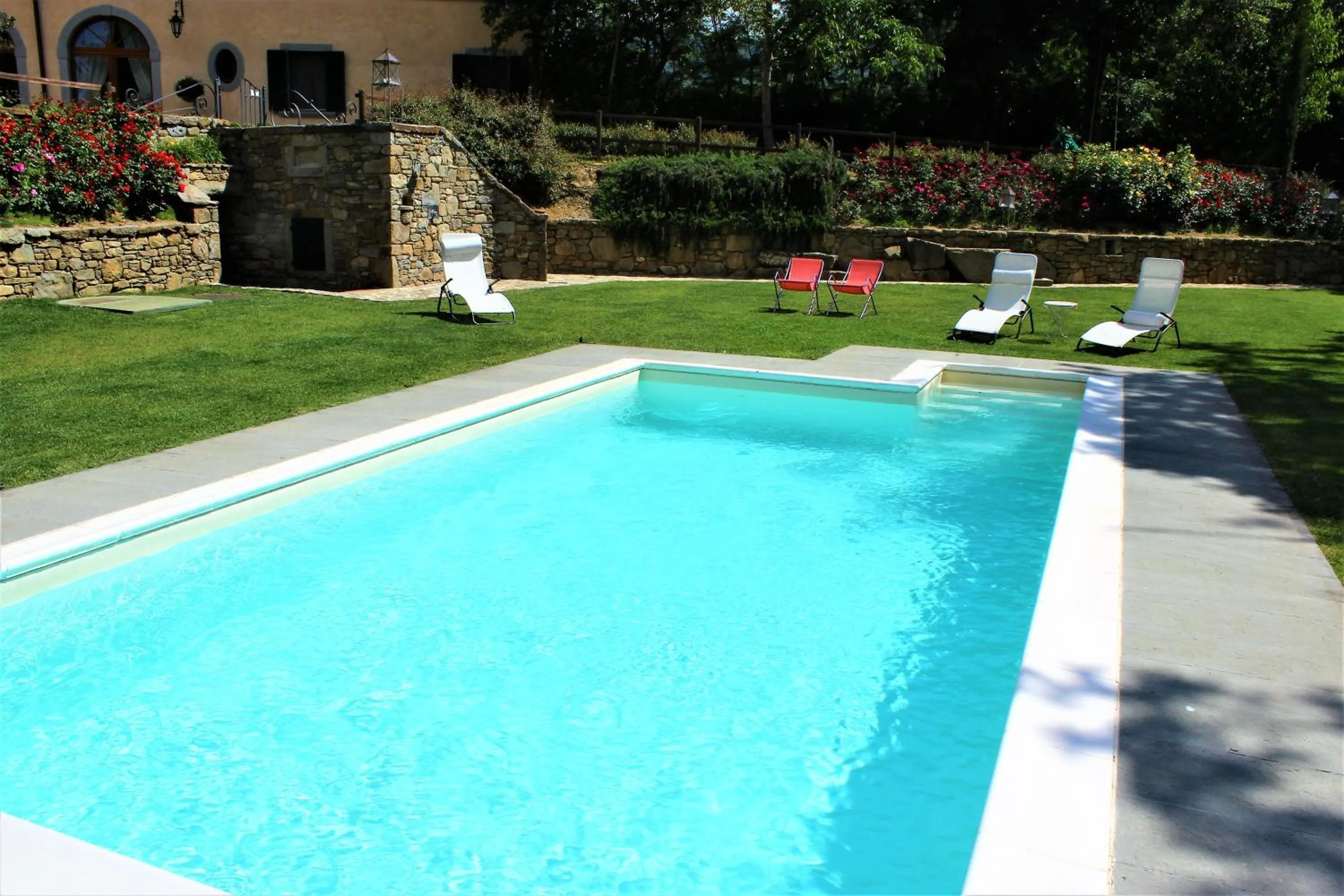 Swimming pool in La Cantina Relais - Fattoria Il Cipresso