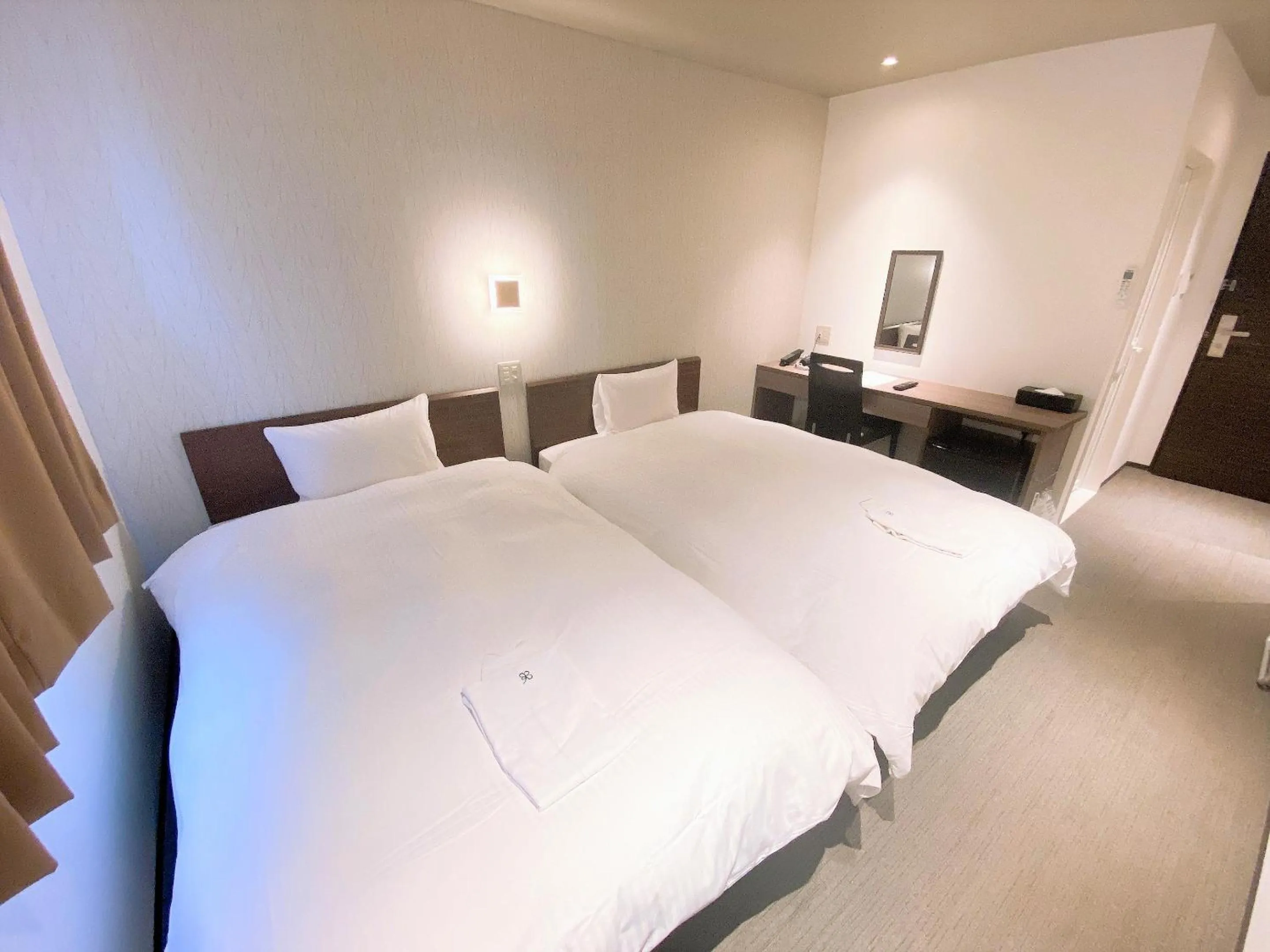 Bed in Hotel chez toi Kanonji