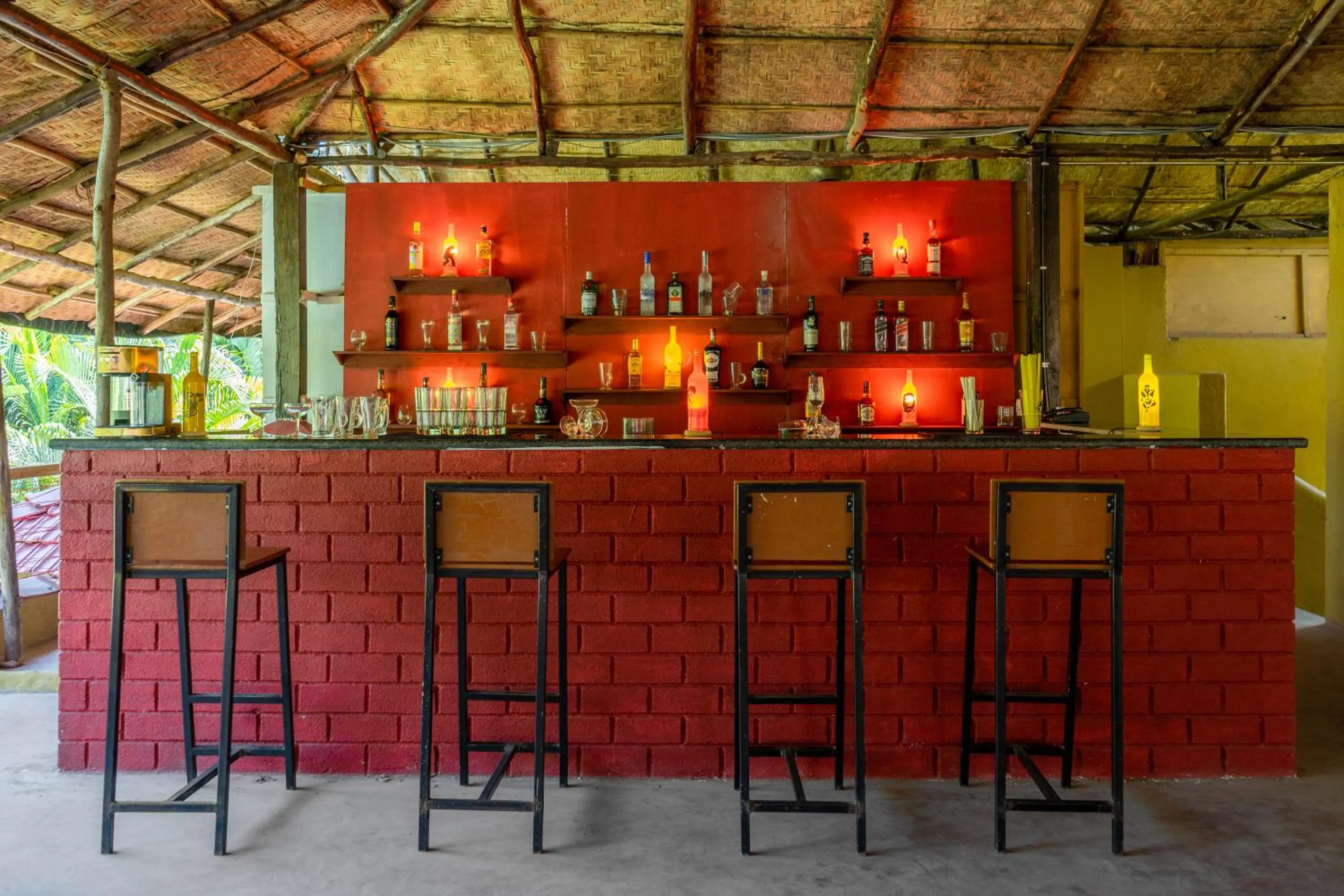 Lounge or bar in juSTa Morjim Beach Resort Goa - 80 Steps from Morjim Beach