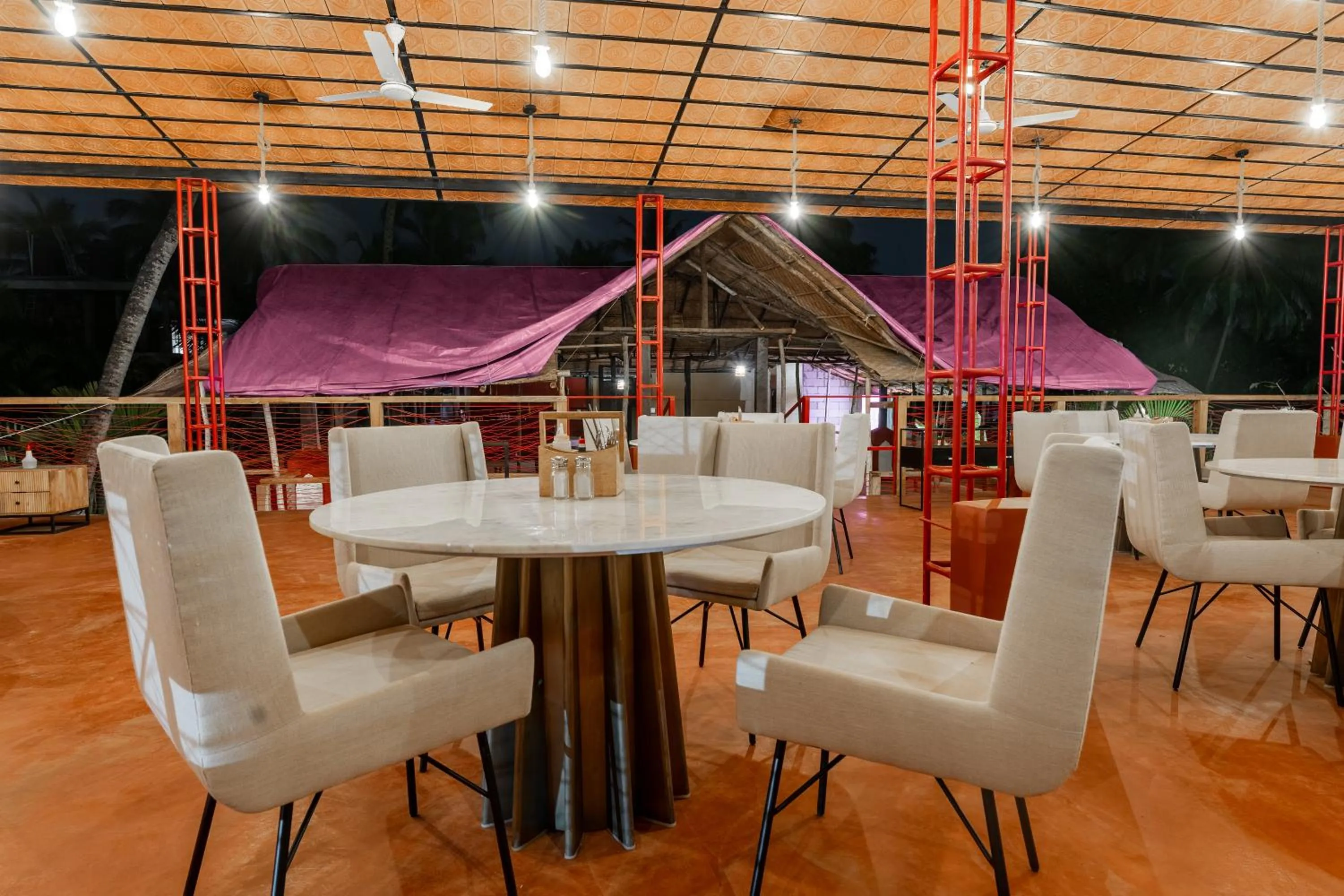 Lounge or bar in juSTa Morjim Beach Resort Goa - 80 Steps from Morjim Beach