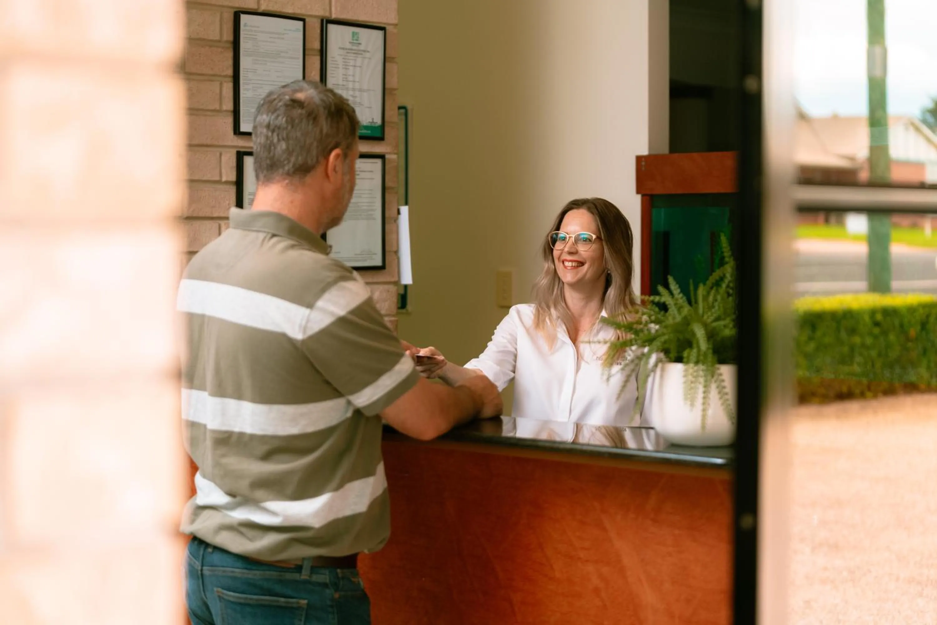 Staff in Best Western Tuscany on Tor Motor Inn