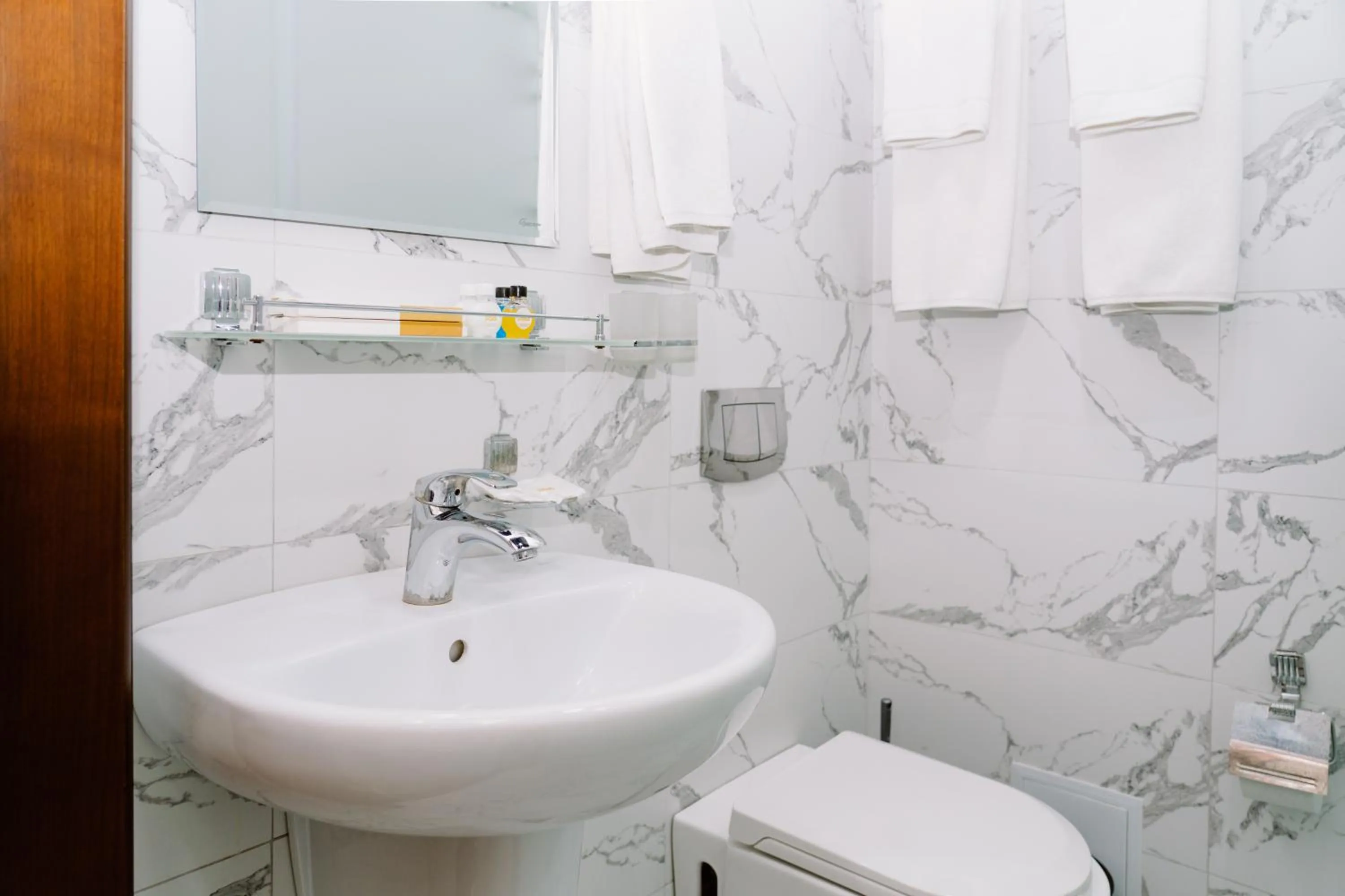 Toilet in PGA Hotel Free Shuttle to Airport