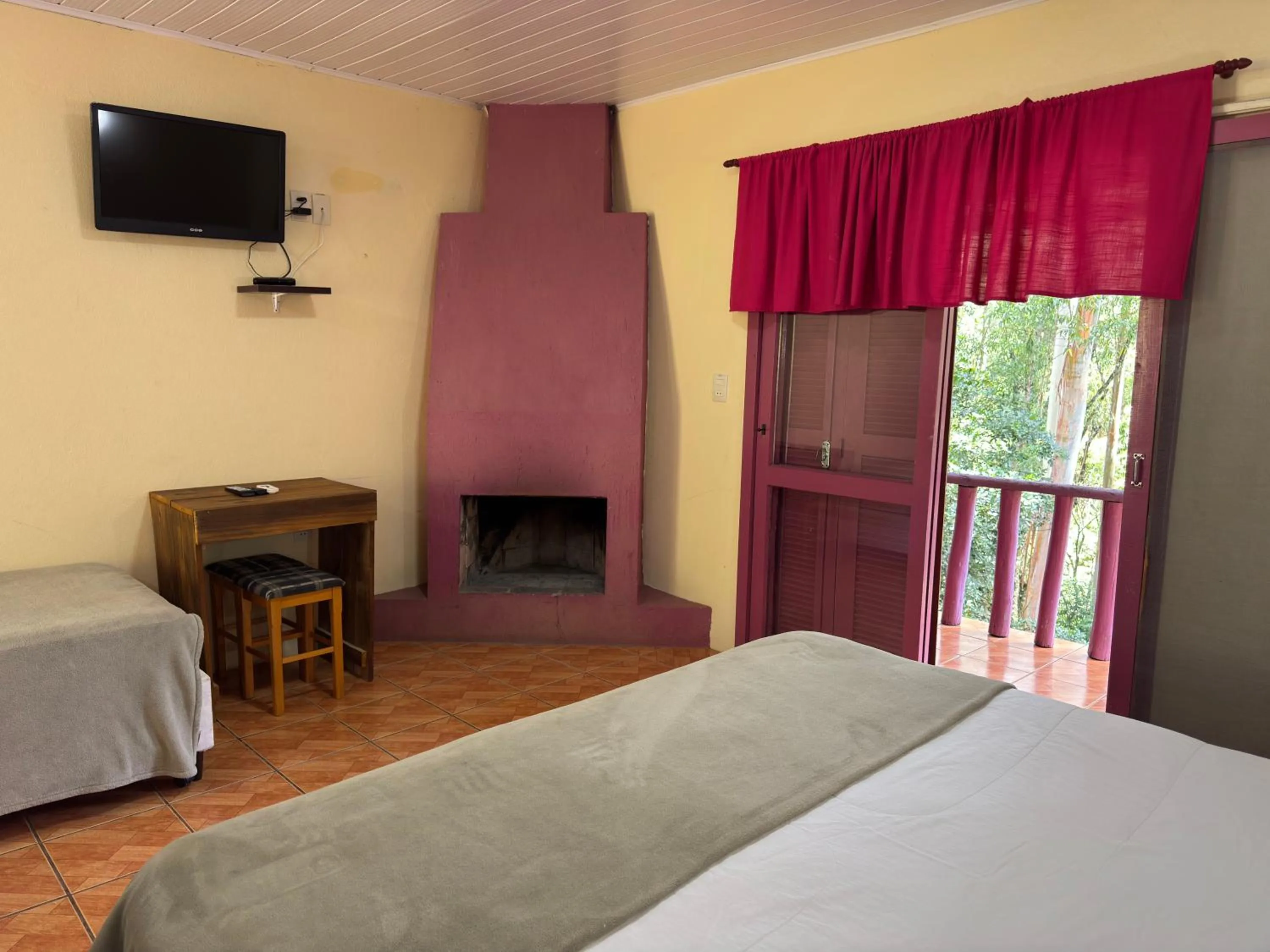 Bed in Pousada da Chacara