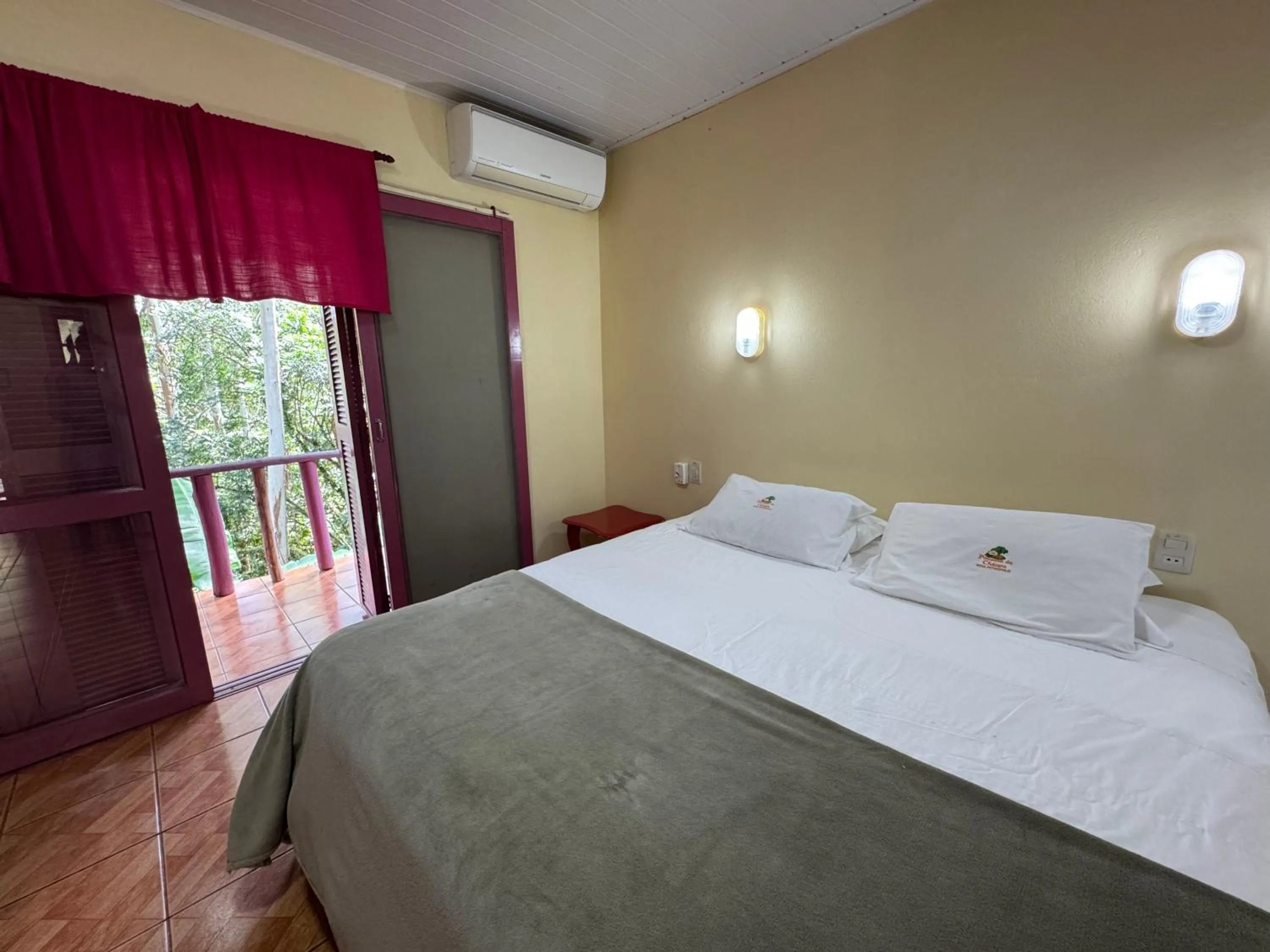 Bed in Pousada da Chacara