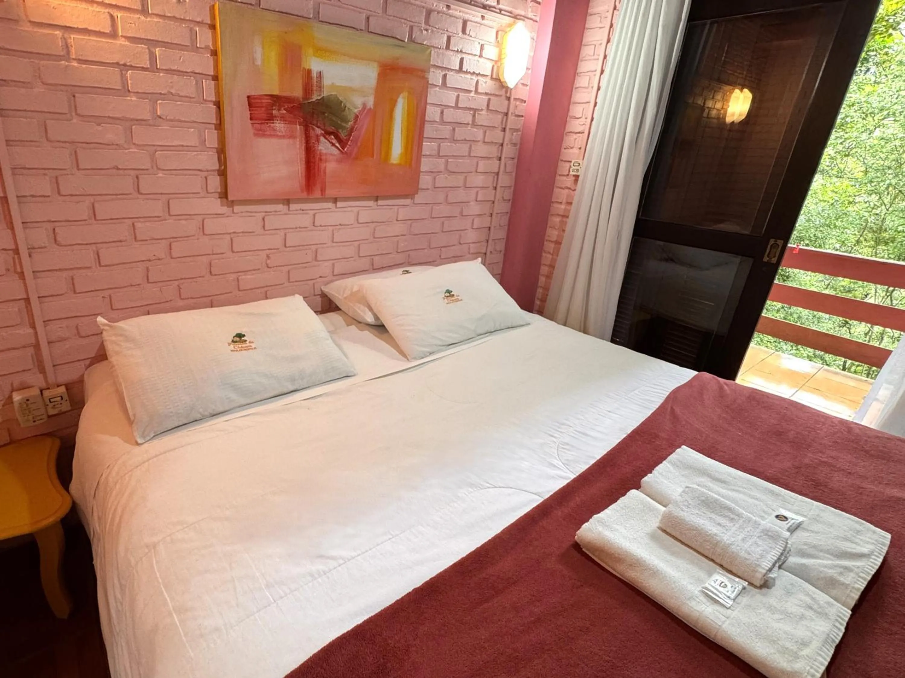 Bed in Pousada da Chacara