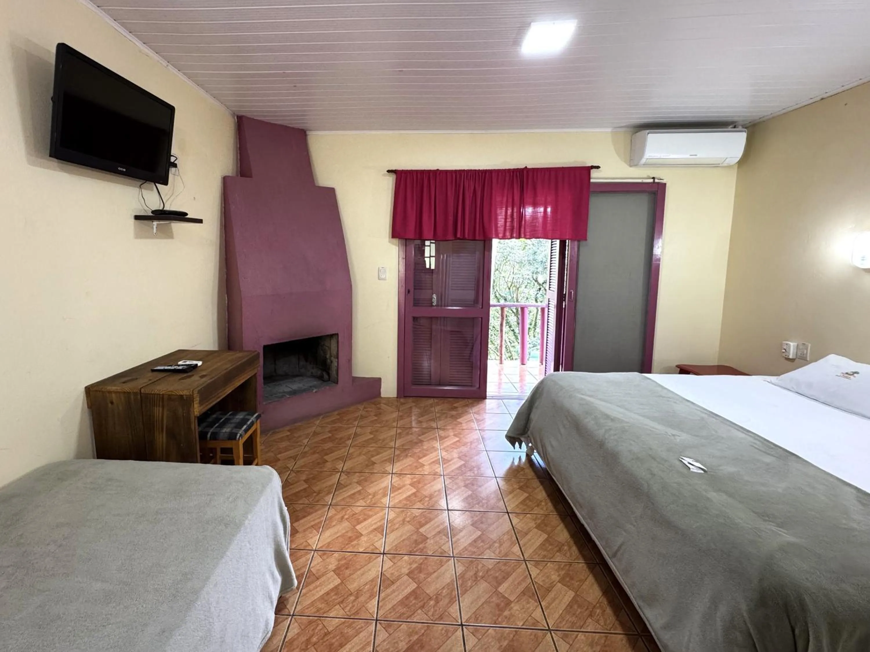 Bed in Pousada da Chacara