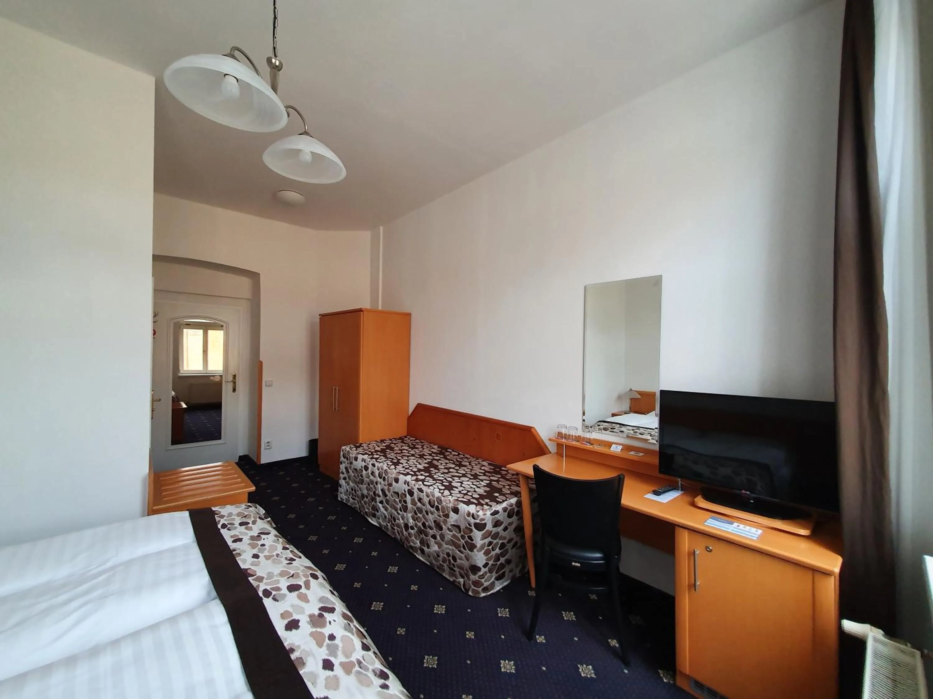 Photo of the whole room, Bed in Máchova