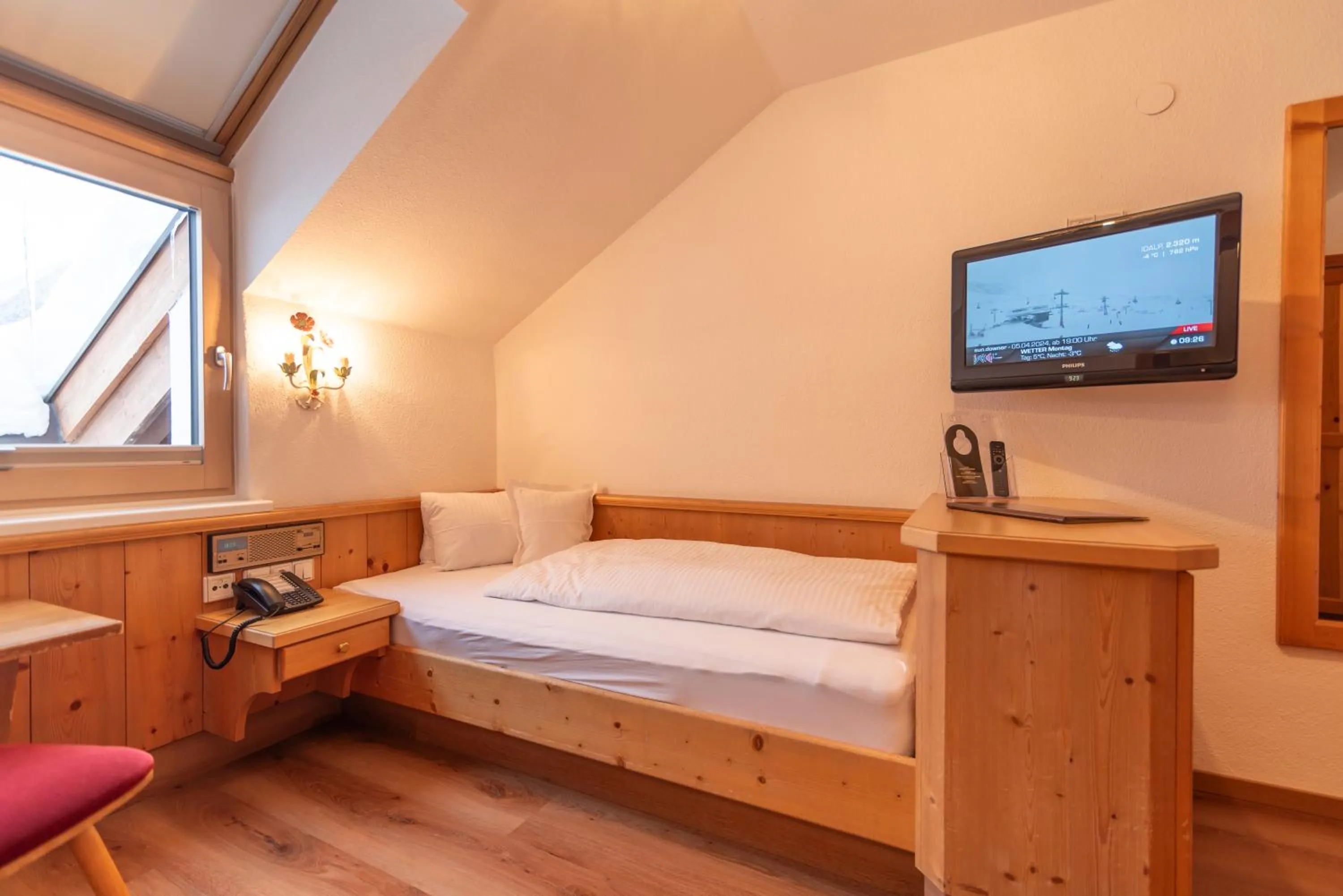 Bed in Hotel Garni Helvetia