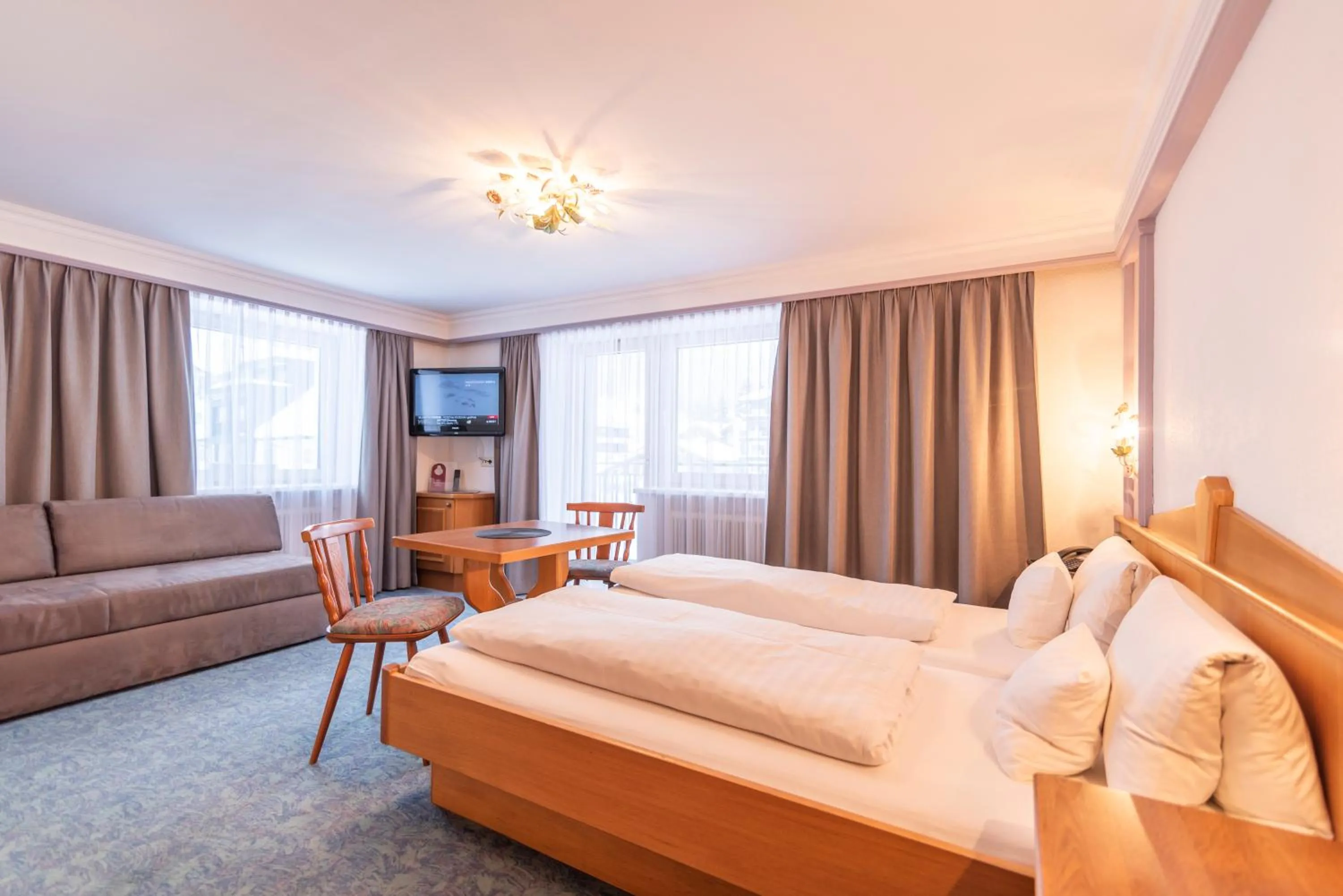 Bed in Hotel Garni Helvetia