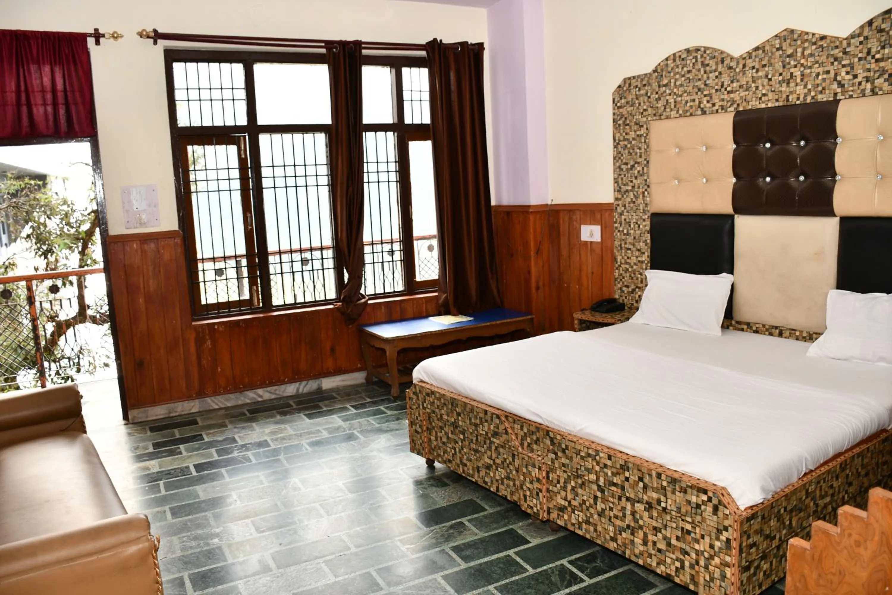 Bed in HOTEL HIMALYAN PARADISE