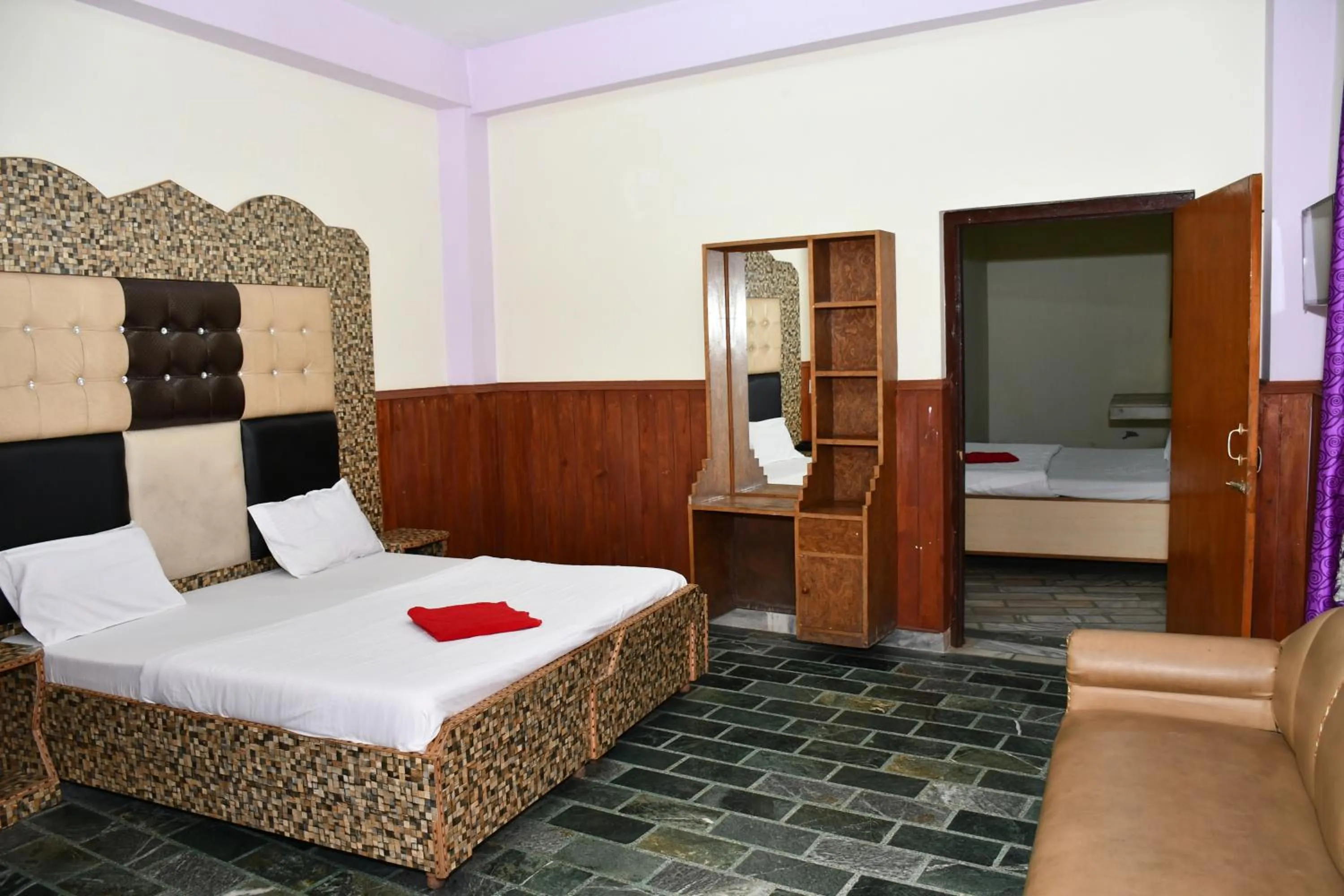 Bed in HOTEL HIMALYAN PARADISE